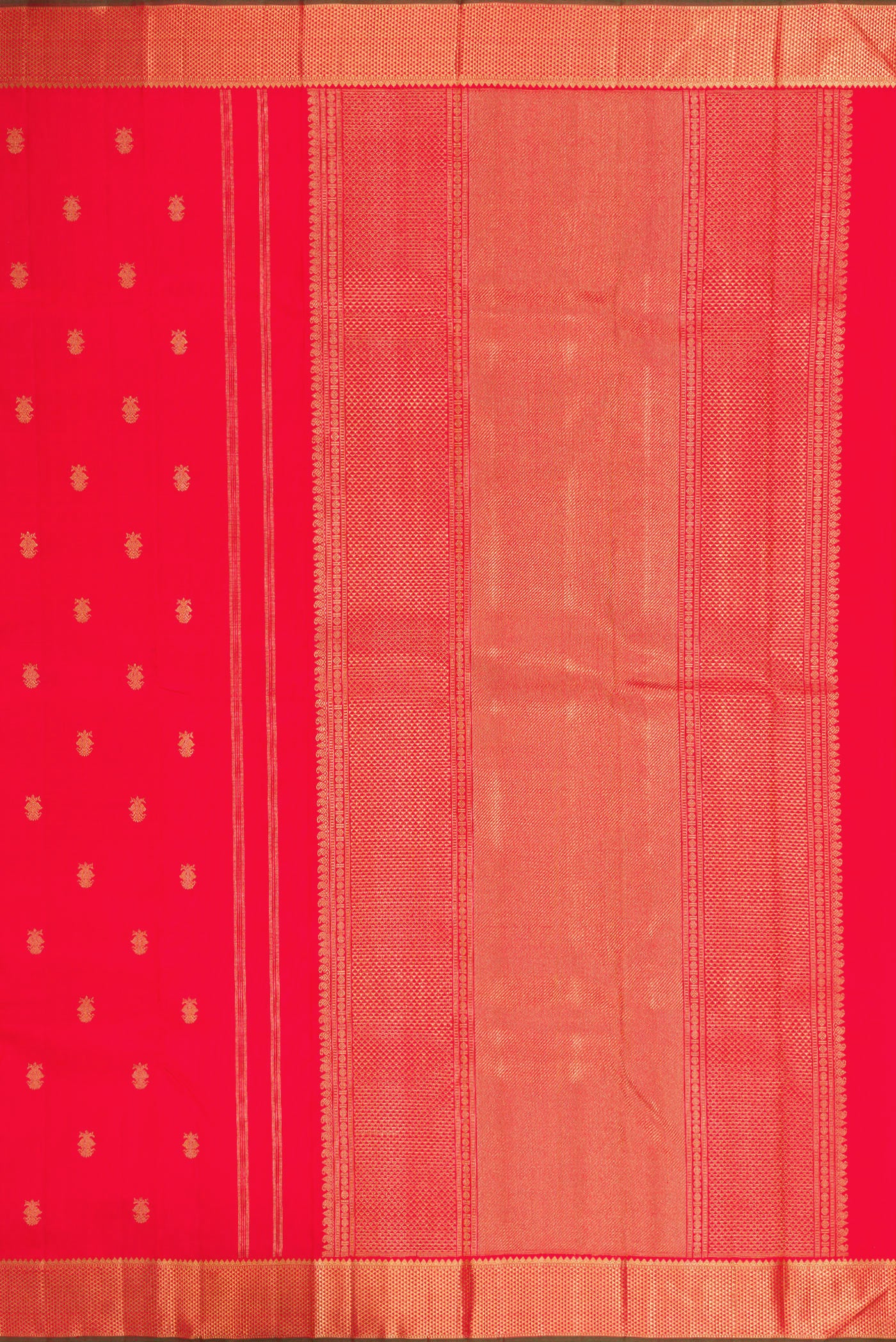 Close up image of the pallu of Red Dual Tone Kanchipuram Silk Saree with Zari Butta on the body and Zari Border. 