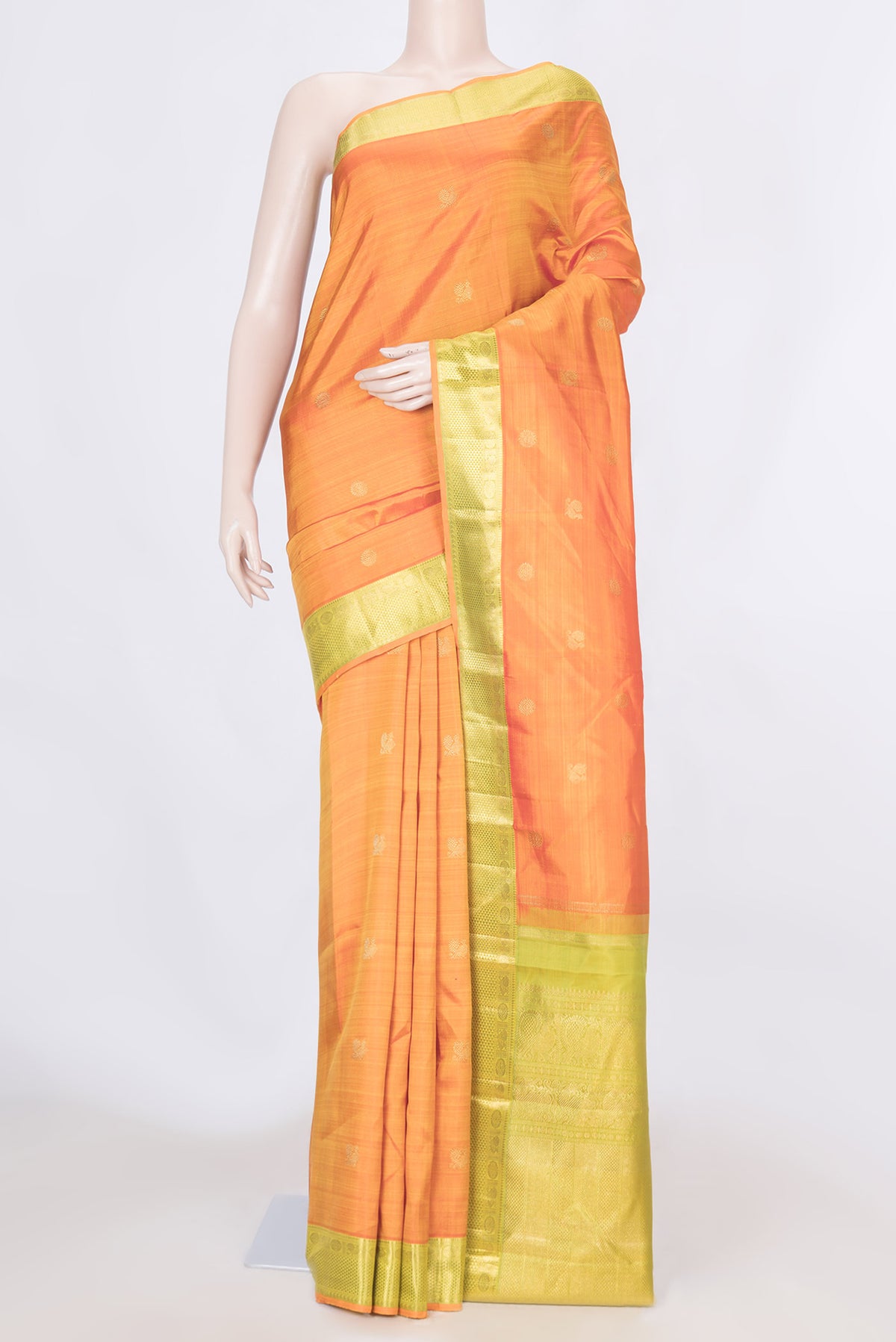 Pure Silk Pure Zari Orange Dual Tone Kanchipuram Saree with Zari Butta on the body and Zari Border displayed on a mannequin