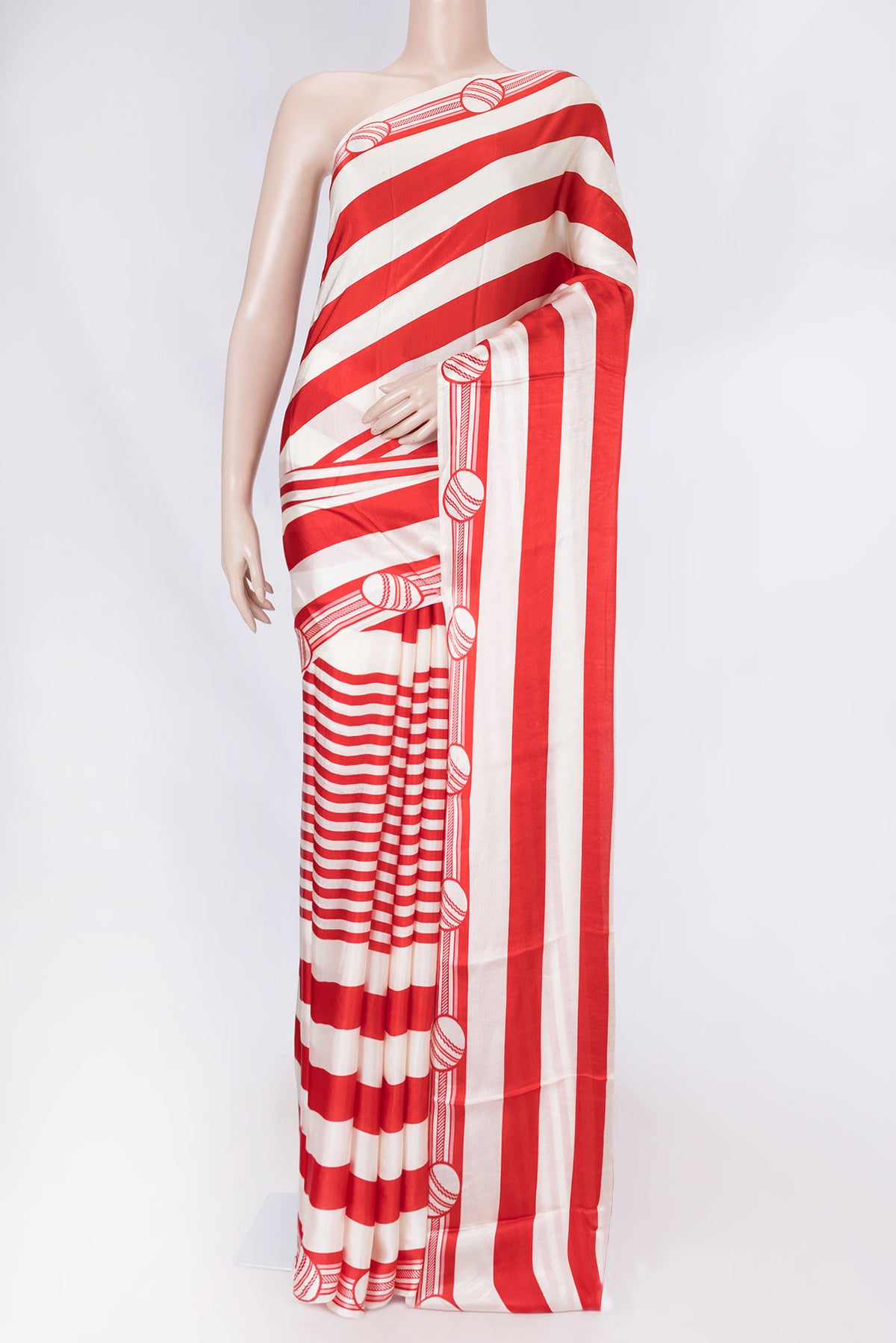 Red Dual Tone Mysore Crepe Saree with Printed design on the body and Printed Border displayed on a mannequin