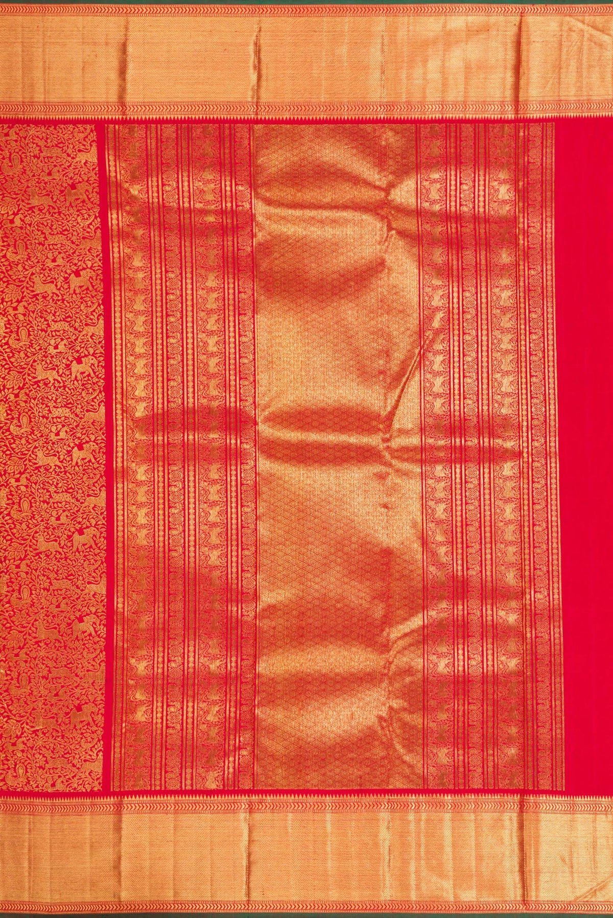 Close up image of the pallu of Pure Silk Pure Zari Red Dual Tone Kanjivaram Saree with Zari Brocade on the body and Zari Border. 