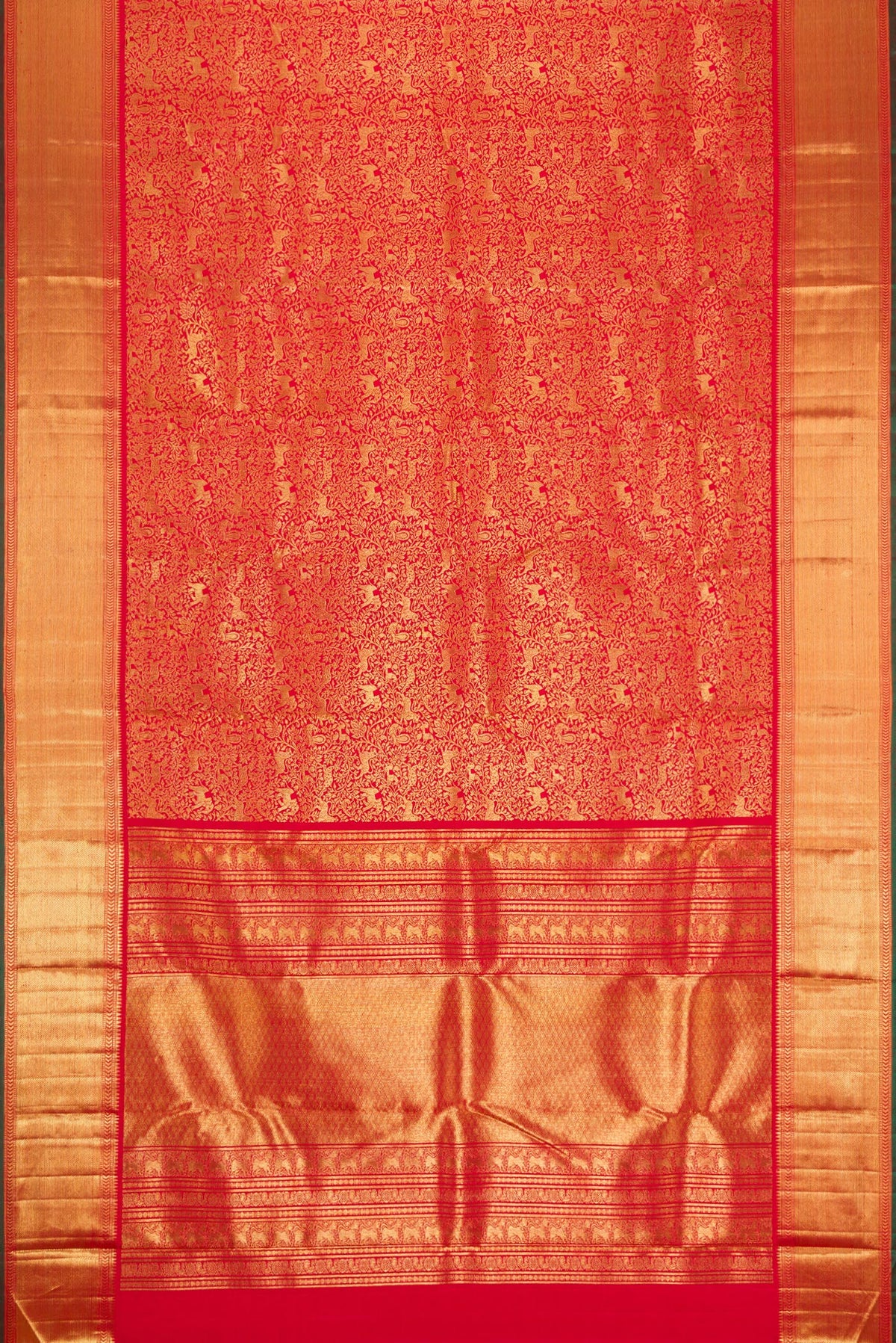 Flat view of Pure Silk Pure Zari Red Dual Tone Kanjivaram Saree with Zari Brocade on the body and Zari Border. 
