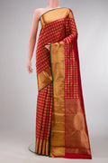 Pure Silk Pure Zari Red Dual Tone Kanjivaram Saree with Zari Brocade on the body and Zari Border.  displayed on a mannequin