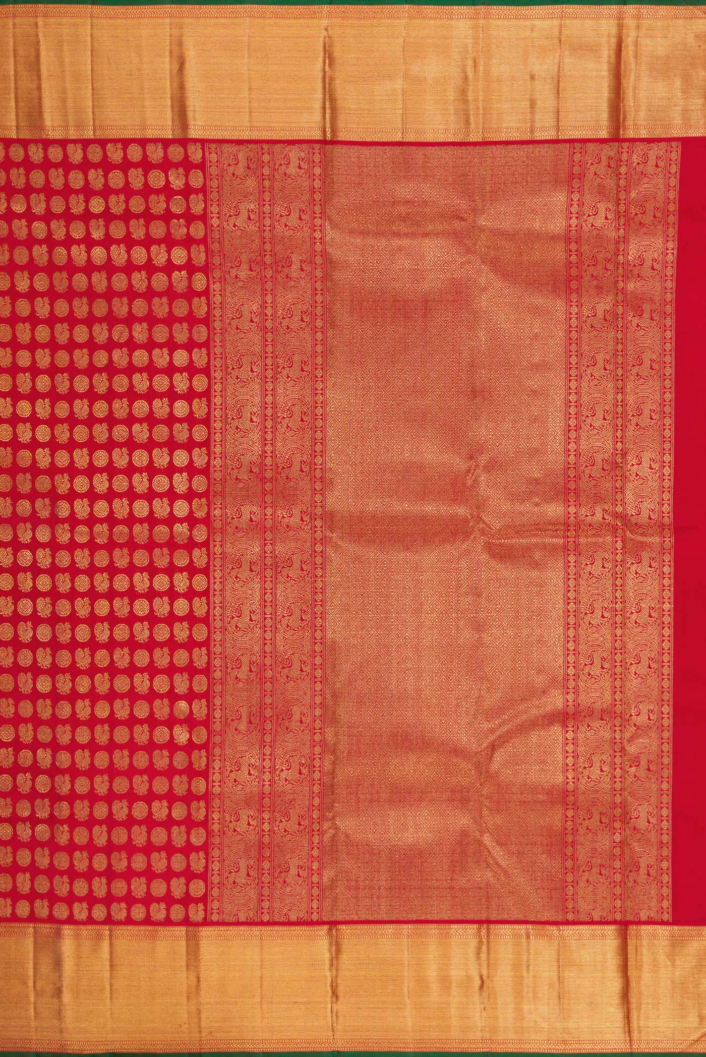 Close up image of the pallu of Pure Silk Pure Zari Red Dual Tone Kanjivaram Saree with Zari Brocade on the body and Zari Border. 
