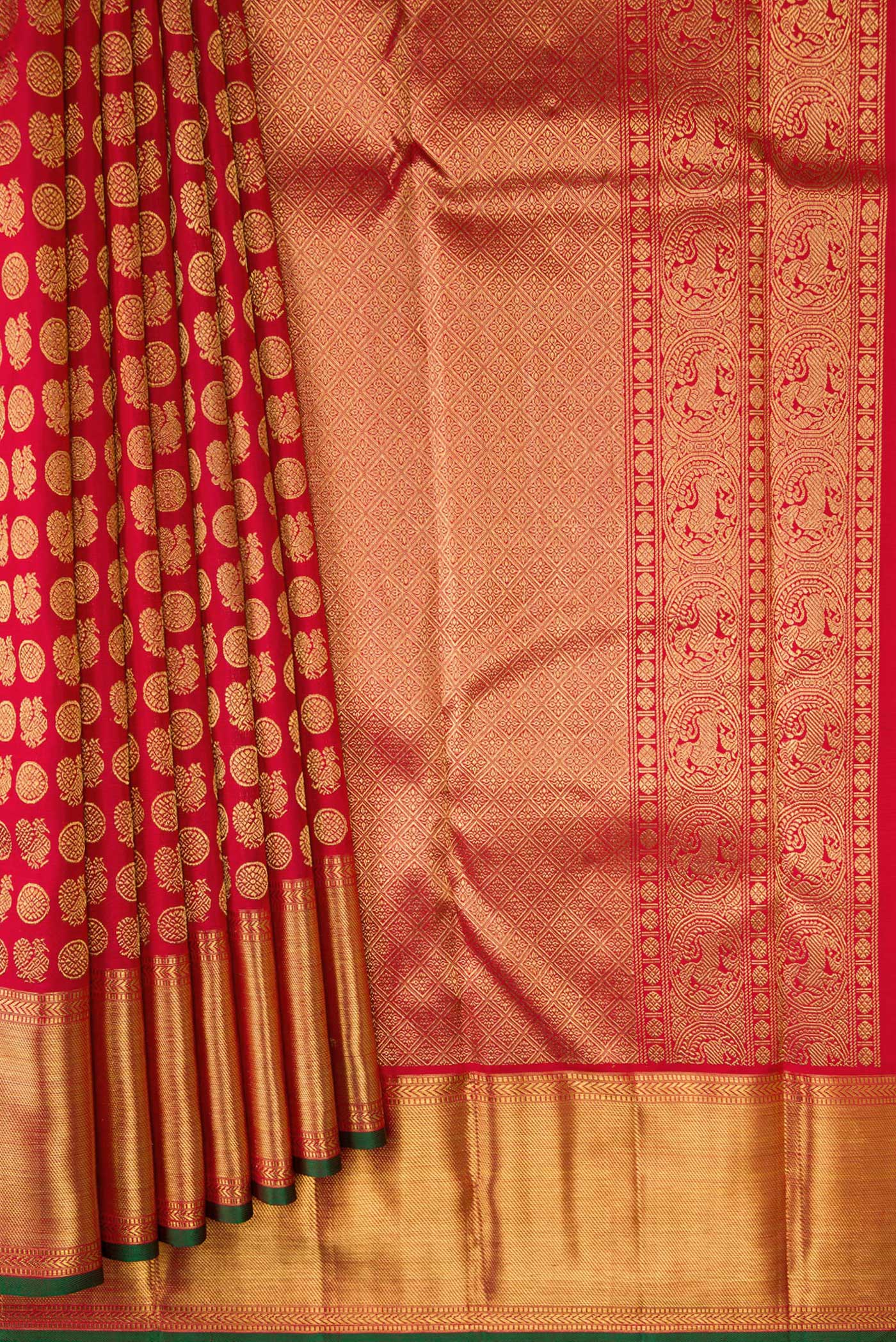 Pleats and pallu of Pure Silk Pure Zari Red Dual Tone Kanjivaram Saree with Zari Brocade on the body and Zari Border. 