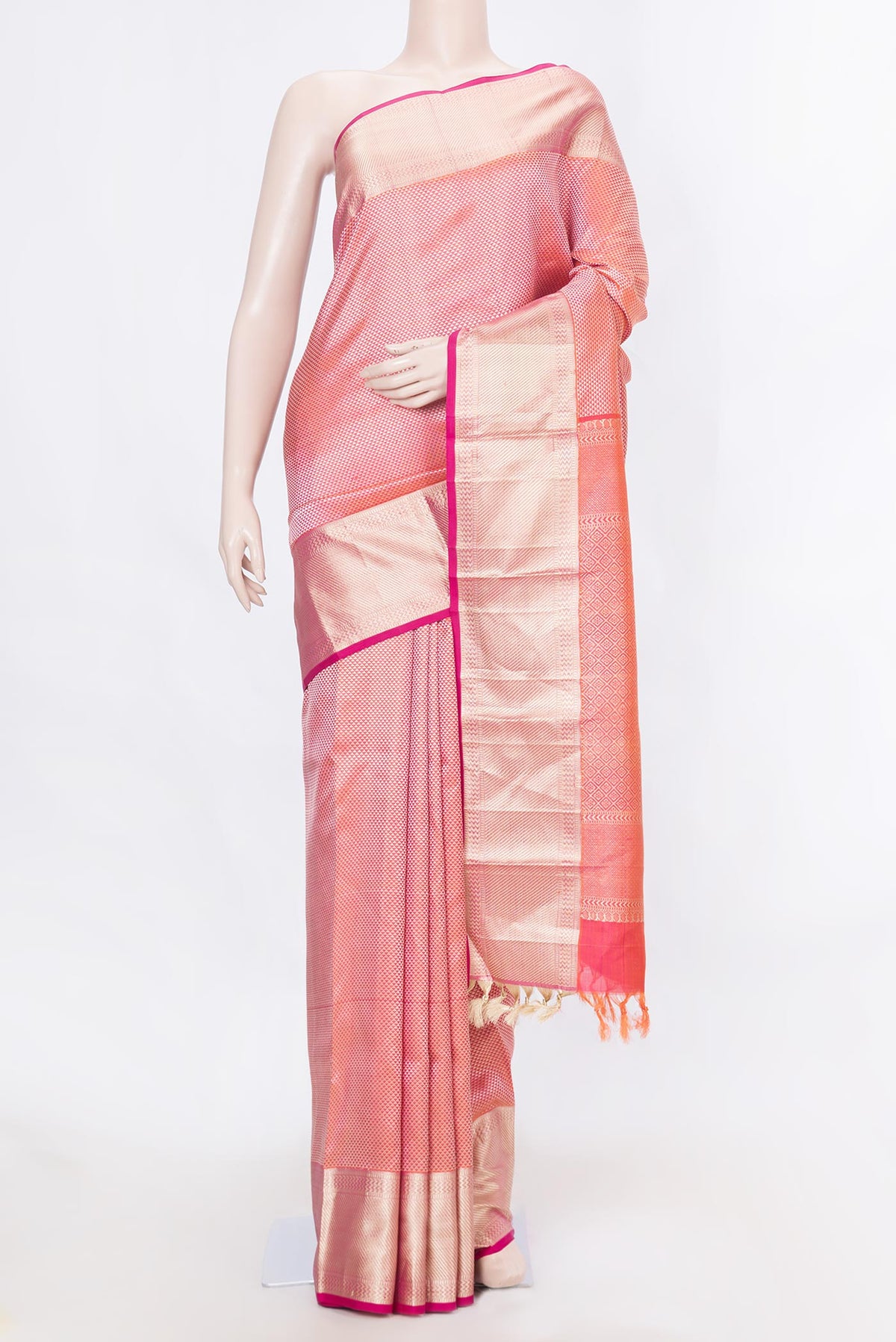 Pure Silk Pure Zari Orange Dual Tone Kanchipuram SareeJacquard design on the body and Zari Border displayed on a mannequin