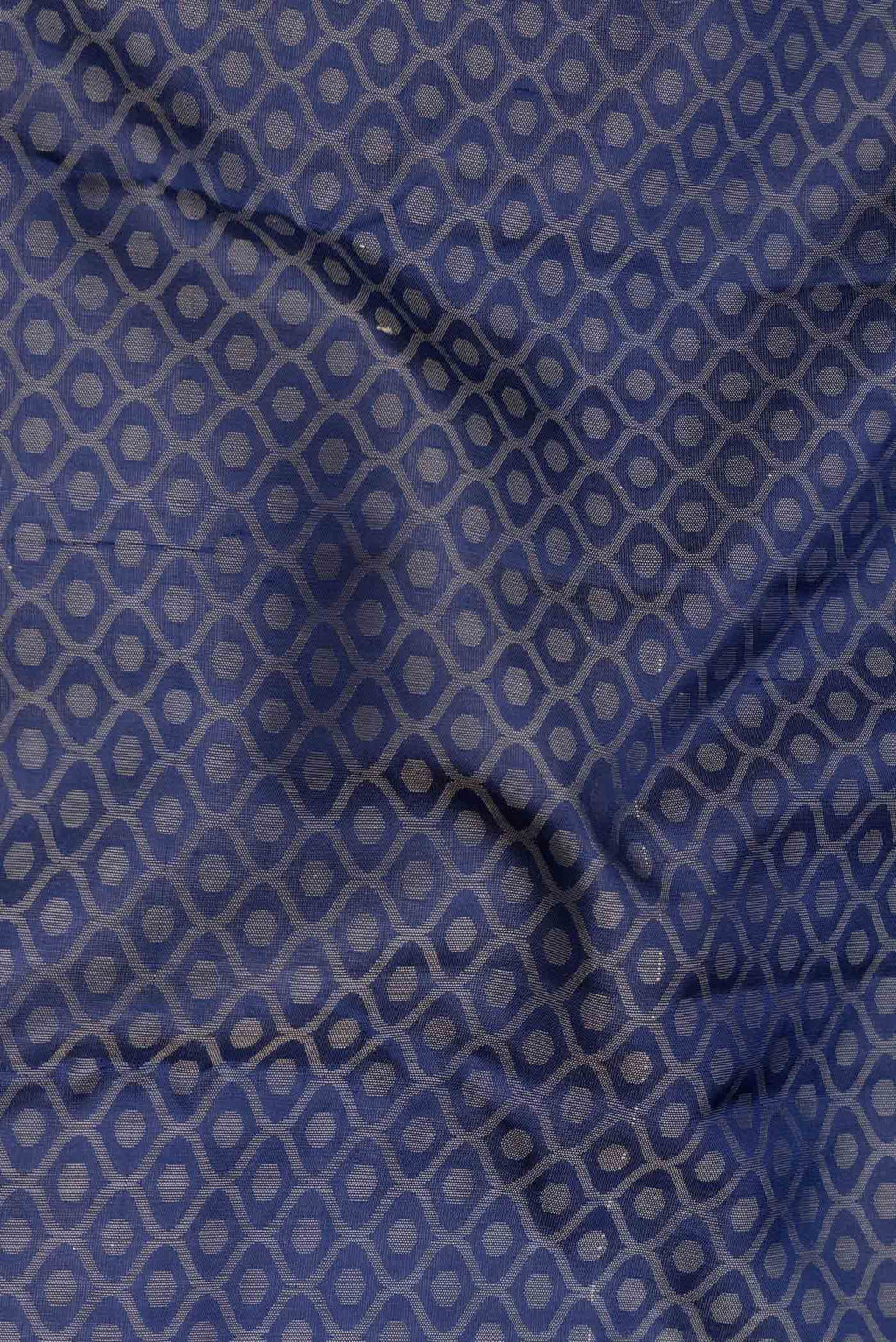 Close up of Navy Blue Dual Tone Kanchipuram Saree with Jacquard design on the body and Thread Border.  displaying folds
