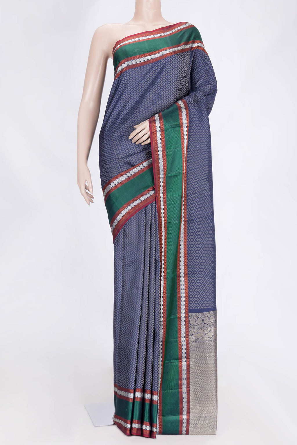 Navy Blue Dual Tone Kanchipuram Saree with Jacquard design on the body and Thread Border.  displayed on a mannequin