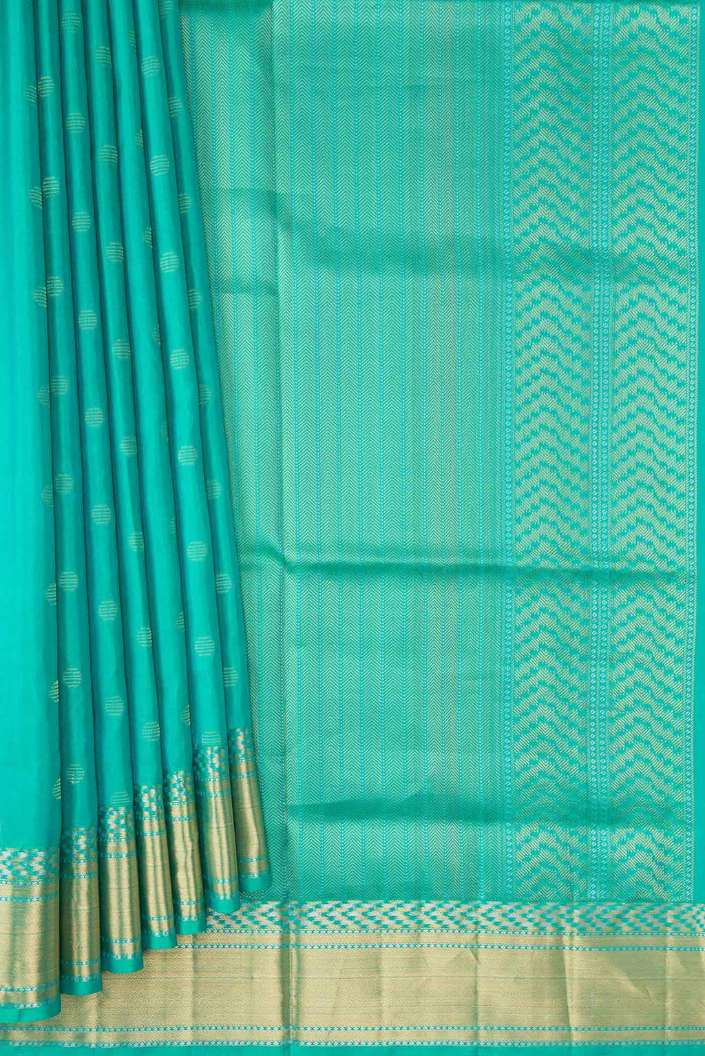 Pleats and pallu of Sea Green Dual Tone Soft Silk Saree with Zari Butta on the body and Zari Border. 