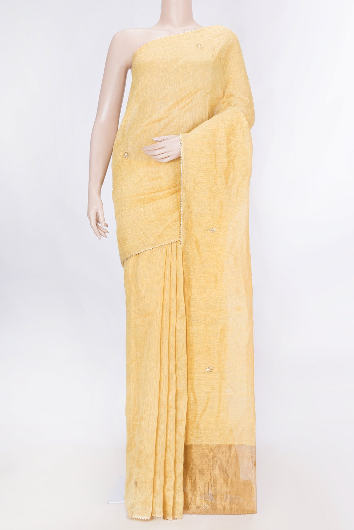 Gold Dual Tone Linen Saree with Embroidery on the body and Embroidery Border displayed on a mannequin