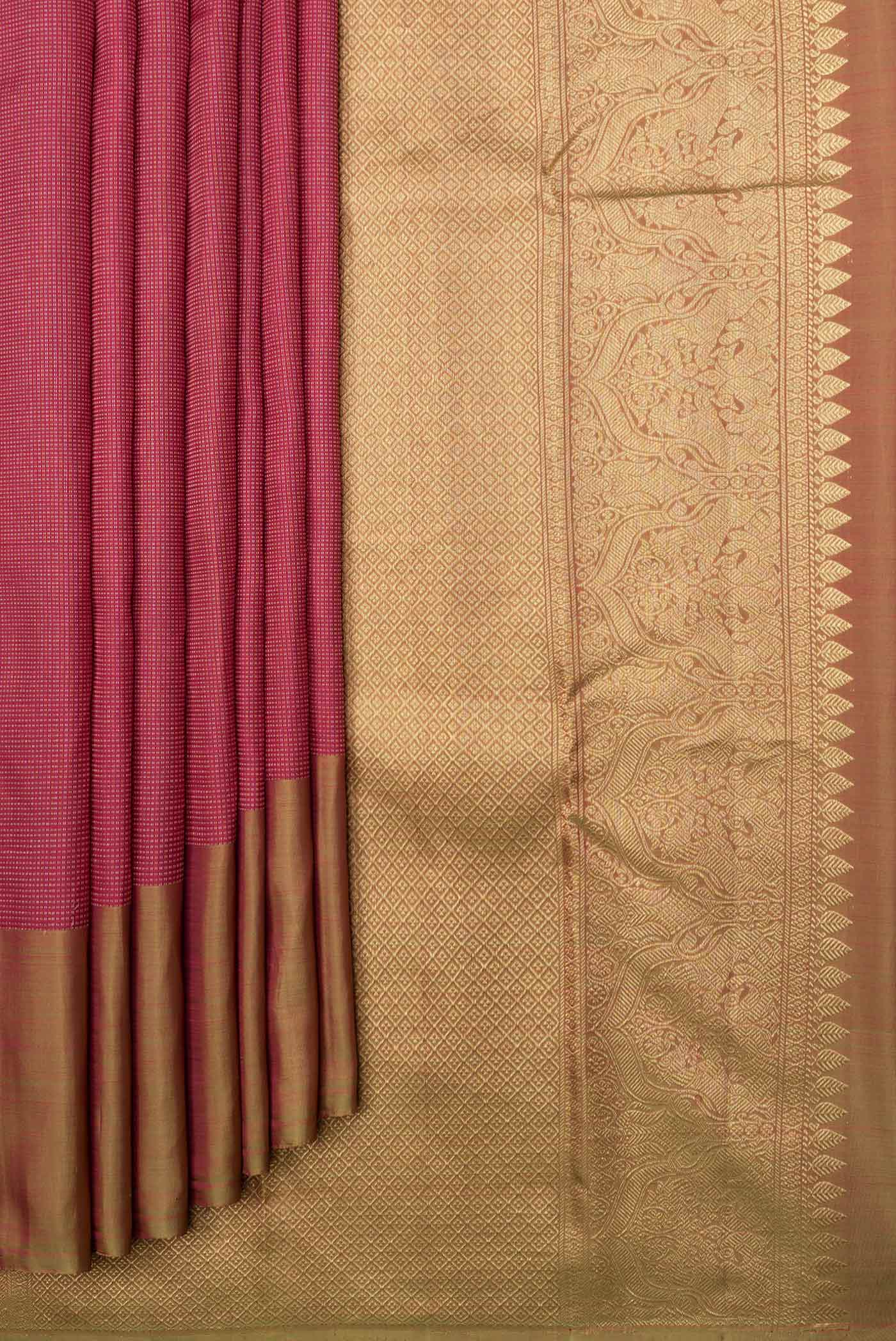 Pleats and pallu of Maroon Dual Tone Kanchipuram Saree with Stripes on the body and Plain Border. 