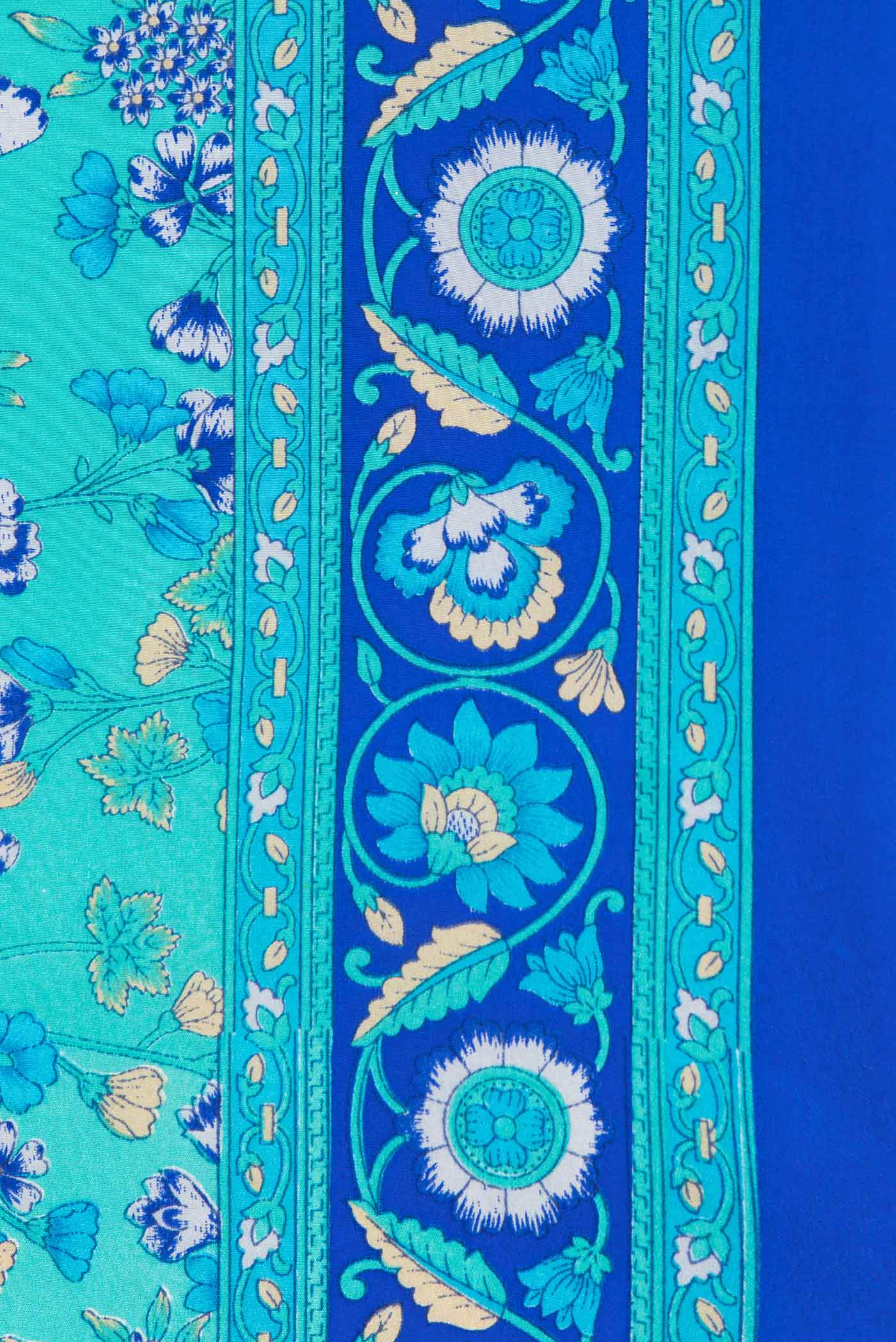 Border image of Sky Blue Dual Tone Mysore Crepe Saree with Printed design on the body and Plain Border