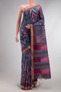 Peacock Blue Dual Tone Tussar Silk Saree with Printed design on the body and Zari Border.  displayed on a mannequin