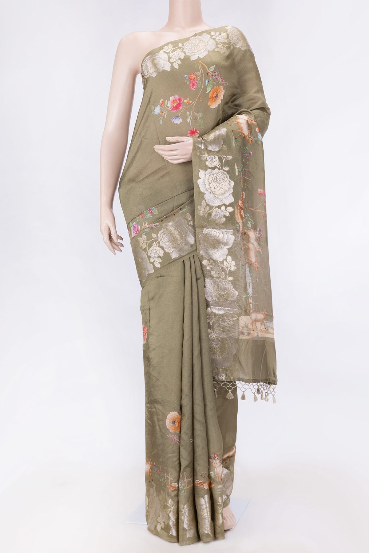 Mehandi Green Dual Tone Tussar Silk SareePrinted design on the body and Zari Border displayed on a mannequin