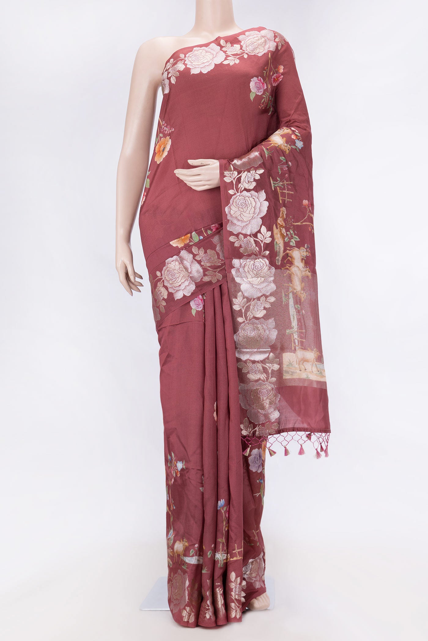 Maroon Dual Tone Tussar Silk SareePrinted design on the body and Zari Border displayed on a mannequin