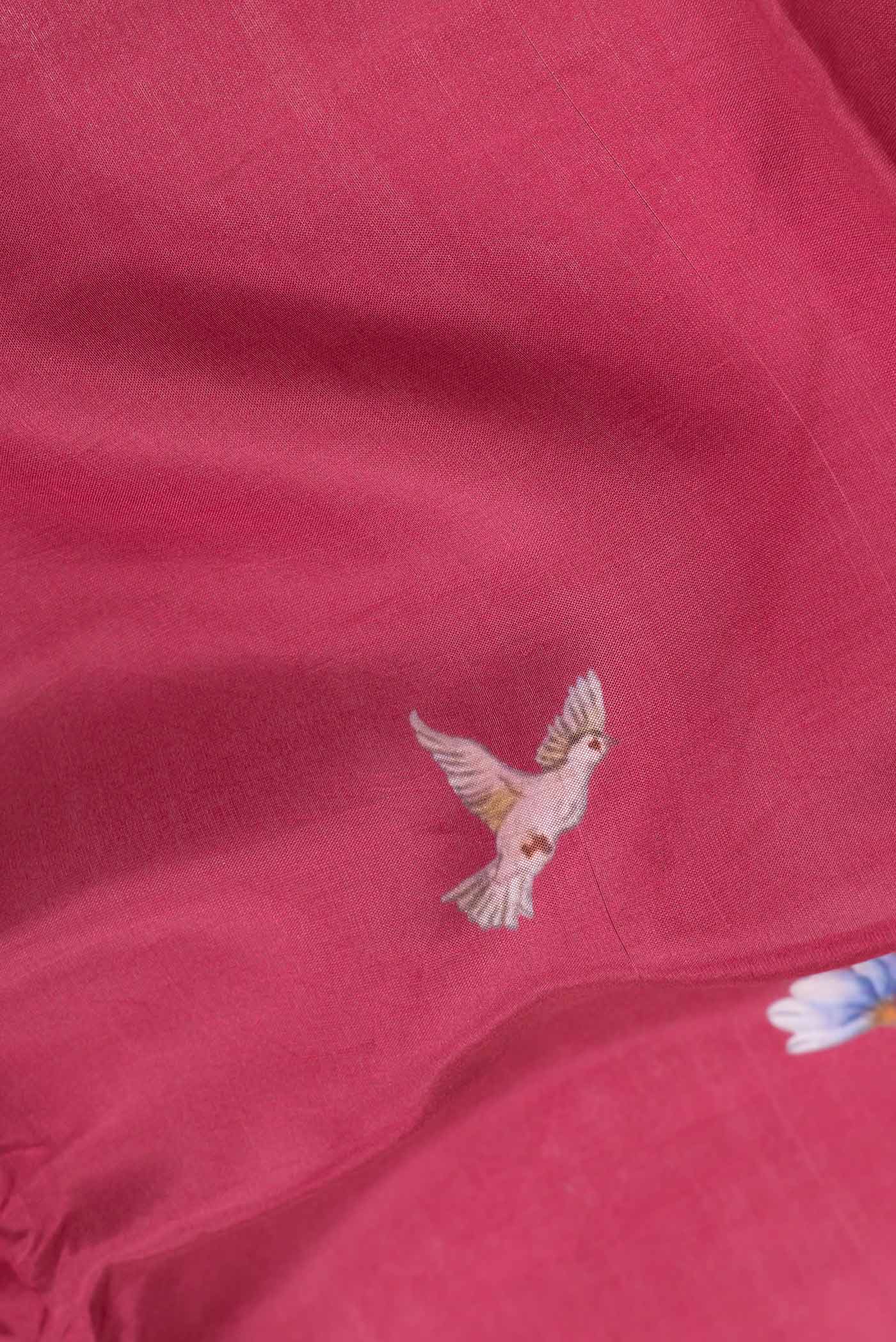 Close up of Maroon Dual Tone Tussar Silk SareePrinted design on the body and Zari Border displaying folds