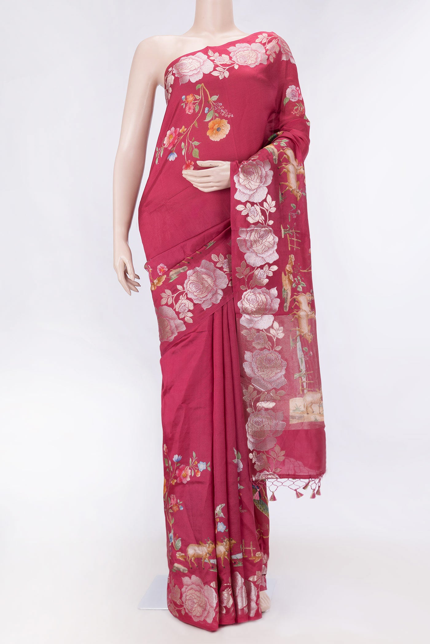 Maroon Dual Tone Tussar Silk SareePrinted design on the body and Zari Border displayed on a mannequin
