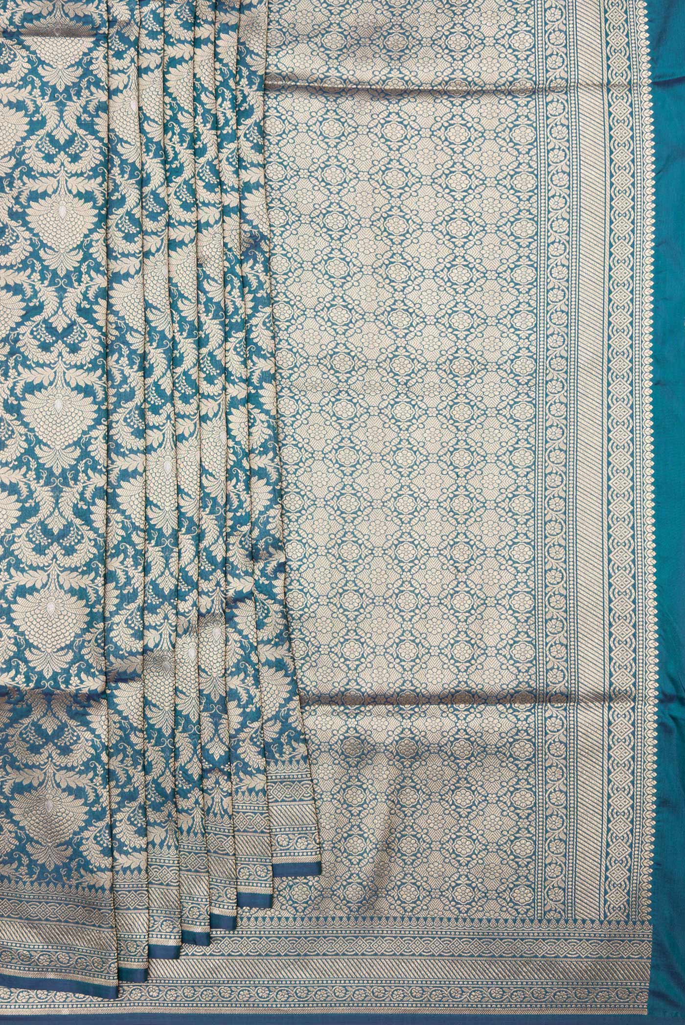 Pleats and pallu of Peacock Blue Dual Tone Banarasi Silk Saree with Zari Brocade on the body and Zari Border. 