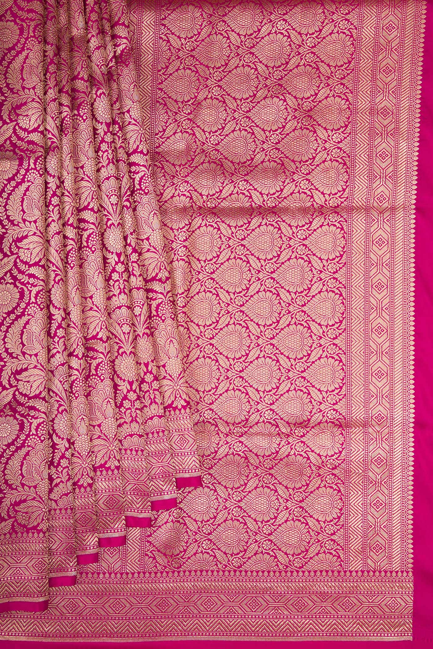 Pleats and pallu of Magenta Banarasi Silk Saree with Zari Brocade on the body and Fancy Border. 