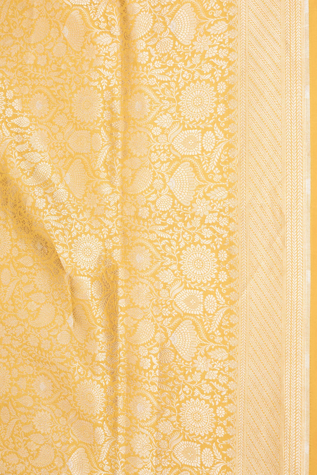 Border image of Yellow Dual Tone Banarasi Silk Saree with Zari Brocade on the body and Zari Border. 