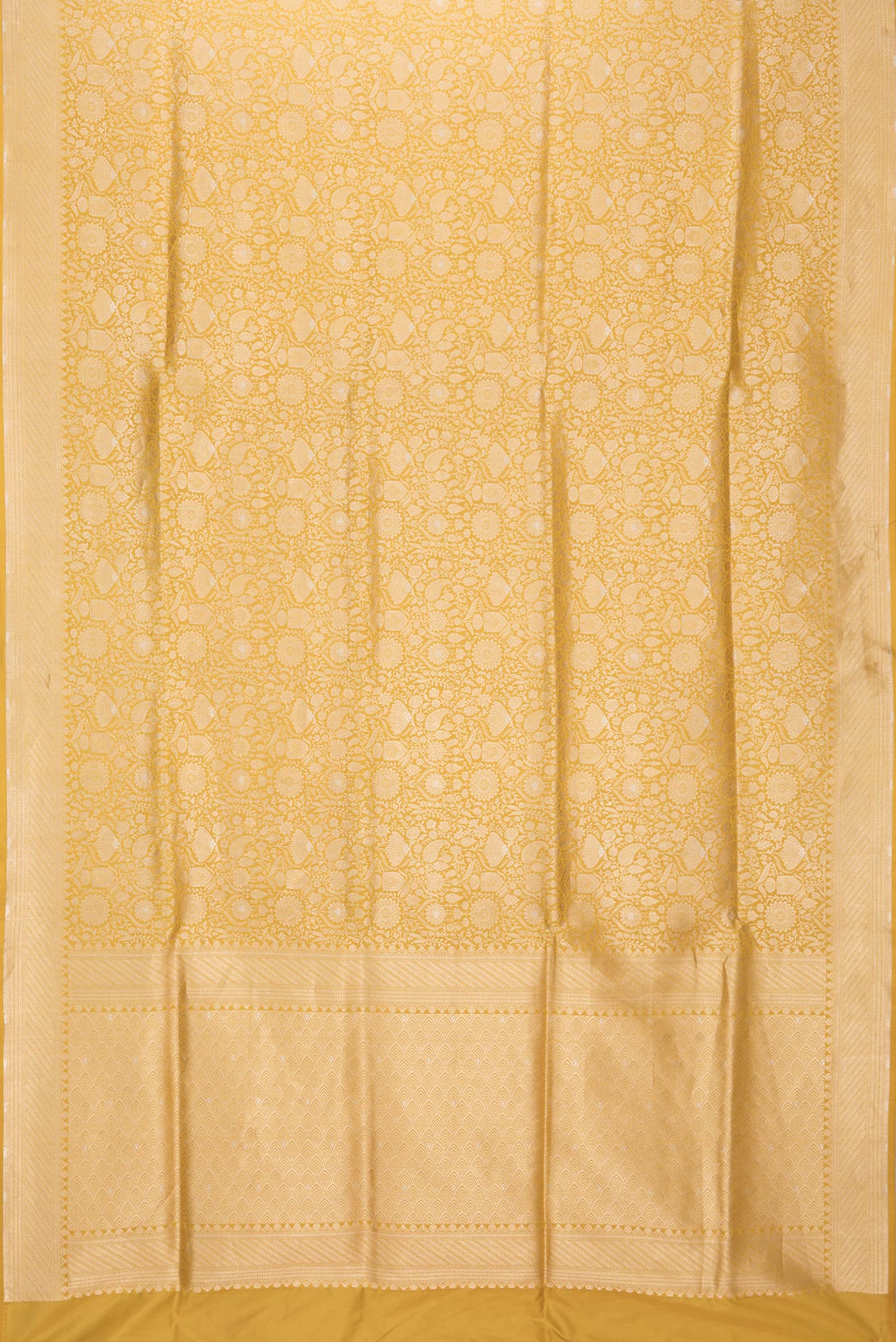 Flat view of Yellow Dual Tone Banarasi Silk Saree with Zari Brocade on the body and Zari Border. 