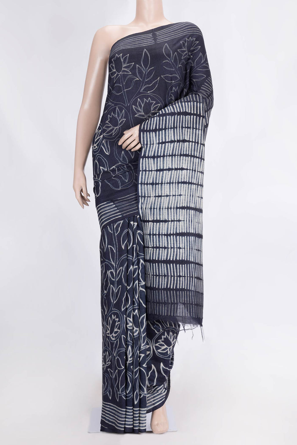 Navy Blue Dual Tone Tussar Saree with Printed design on the body and Printed Border.  displayed on a mannequin