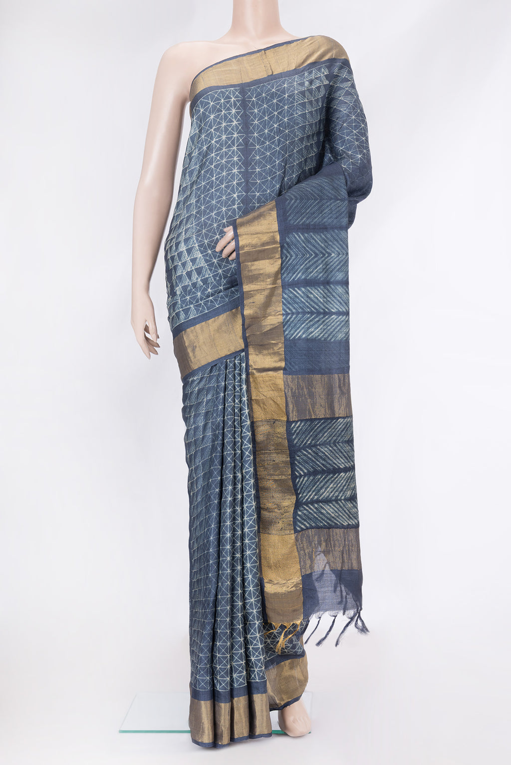 Navy Blue Dual Tone Tussar Silk Saree with Printed design on the body and Zari Border.  displayed on a mannequin