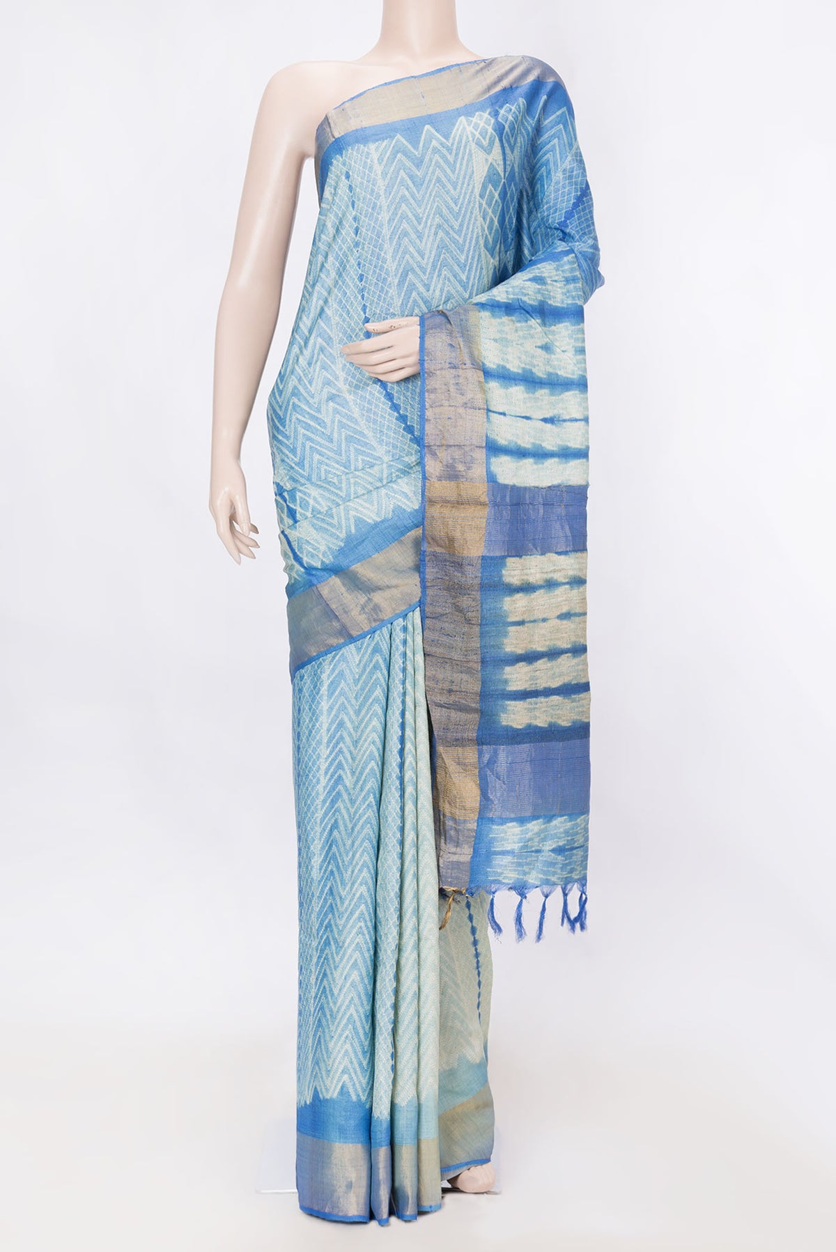 Royal Blue Dual Tone Tussar Silk SareePrinted design on the body and Zari Border displayed on a mannequin