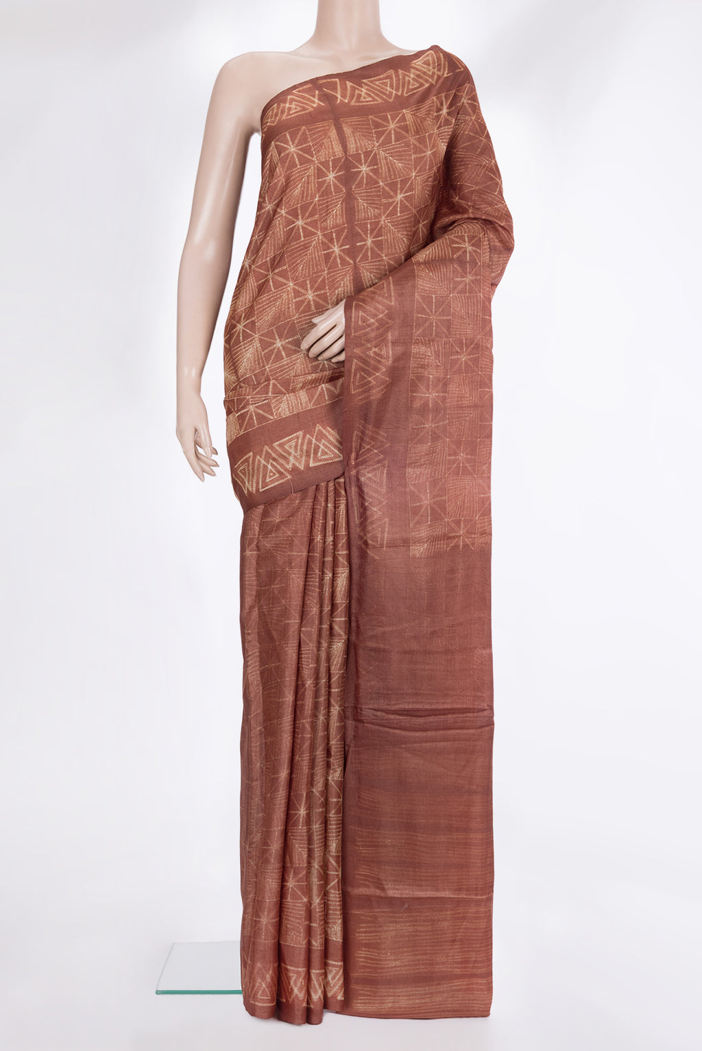 Brown Dual Tone Georgette Saree with Printed design on the body and Fancy Border.  displayed on a mannequin