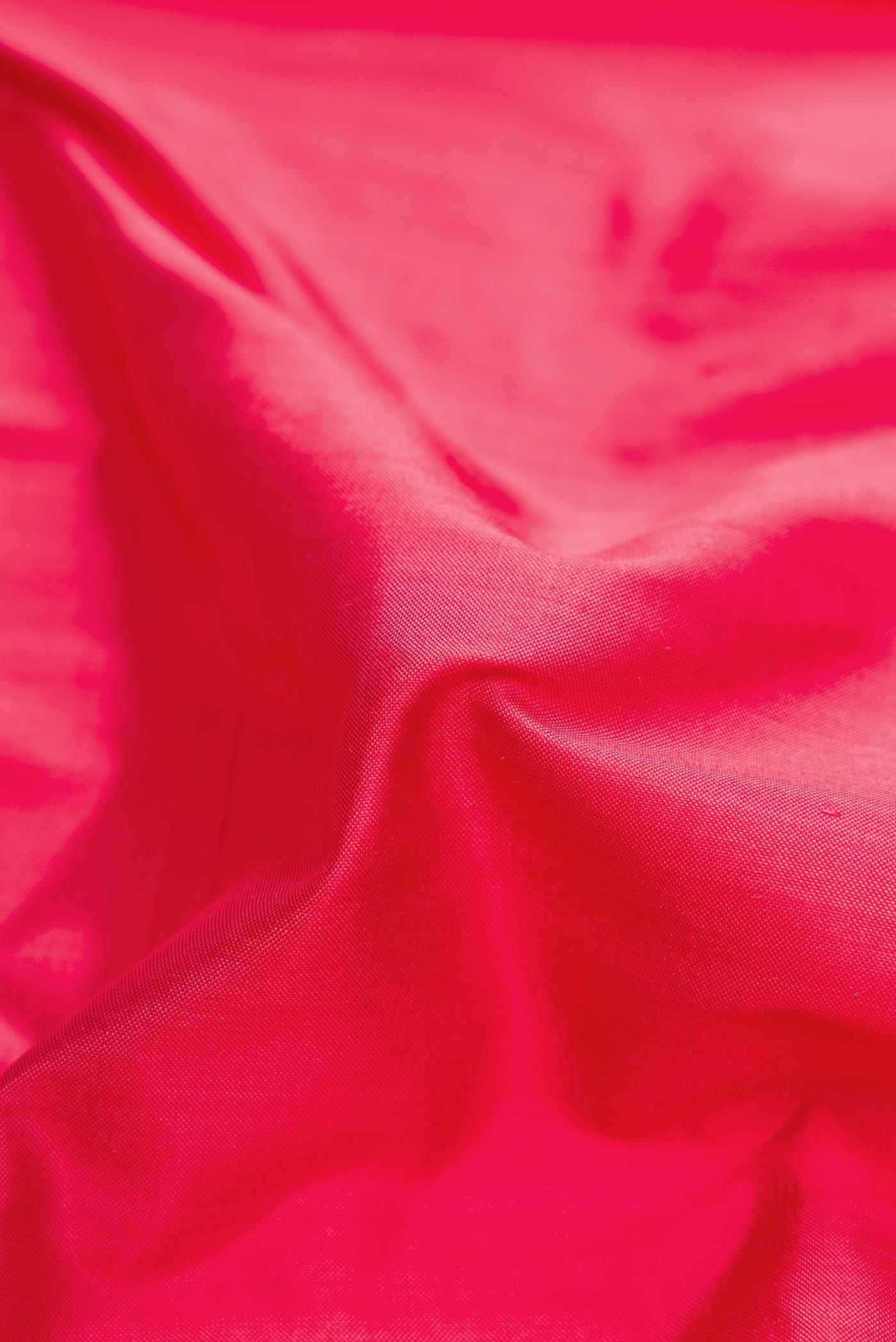 Close up of Pink Pochampally Silk Saree with Plain Body and Temple Border displaying folds