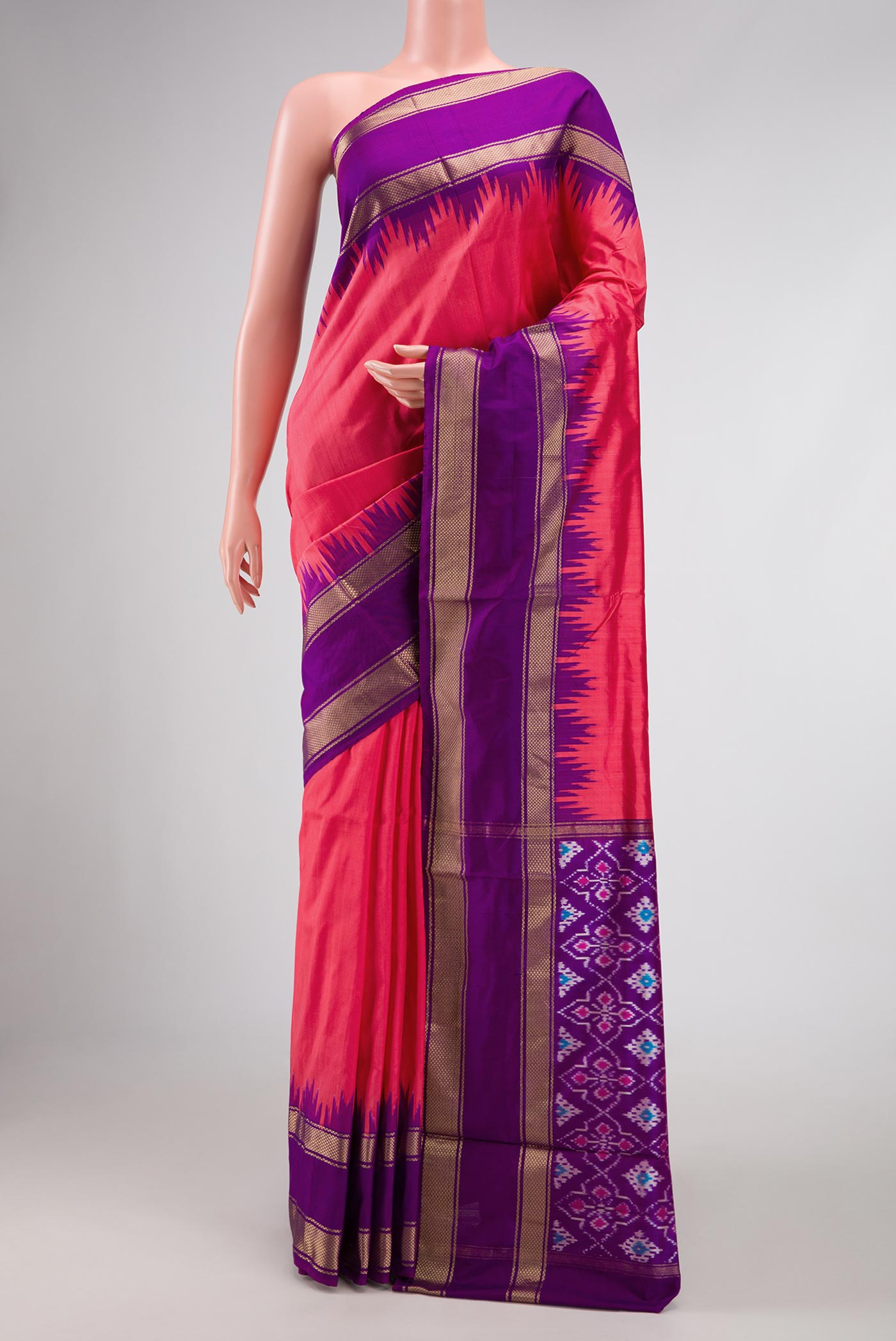 Pink Pochampally Silk Saree with Plain Body and Temple Border displayed on a mannequin