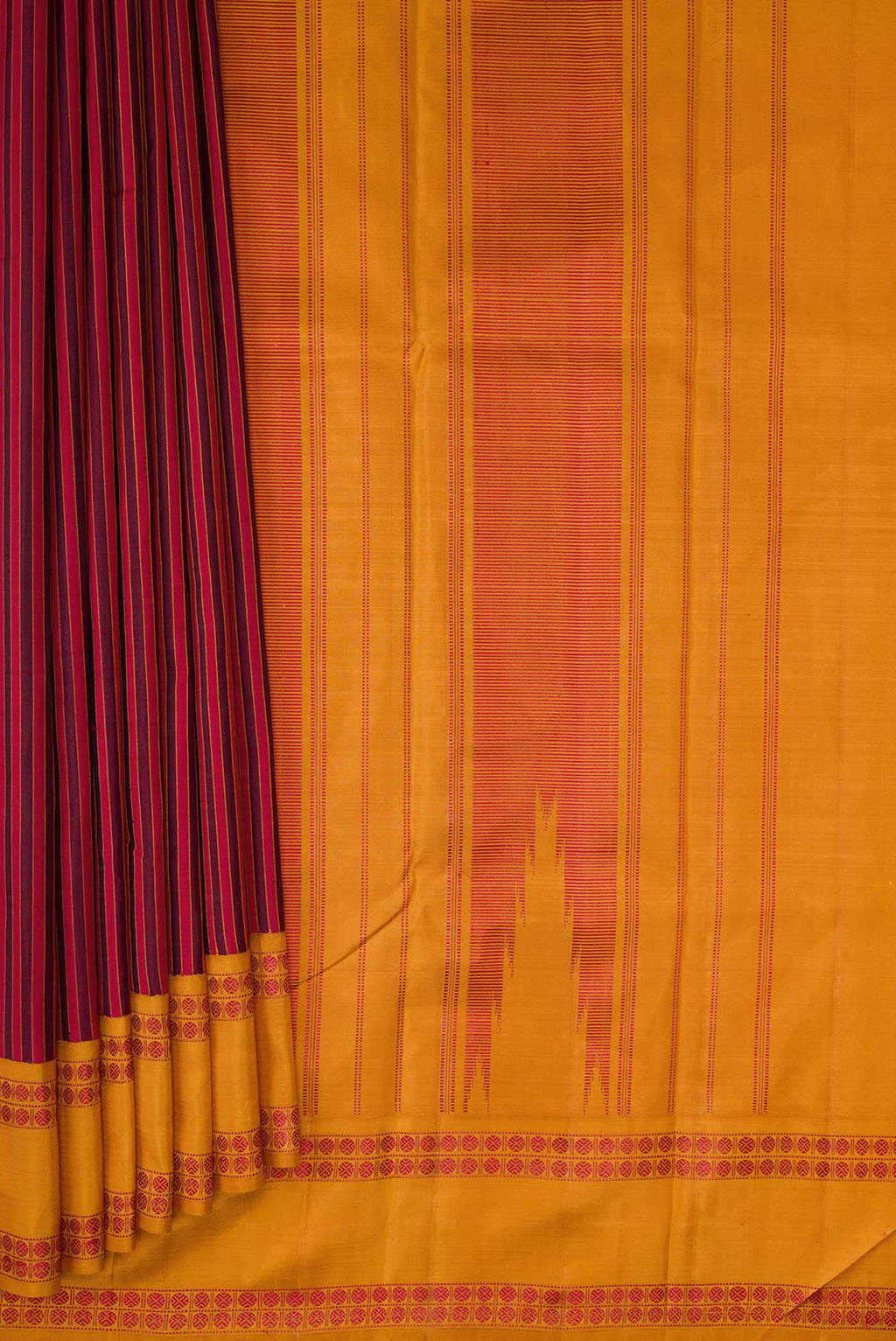 Pleats and pallu of Maroon Dual Tone Kanchipuram Silk Saree with Stripes on the body and Thread Border