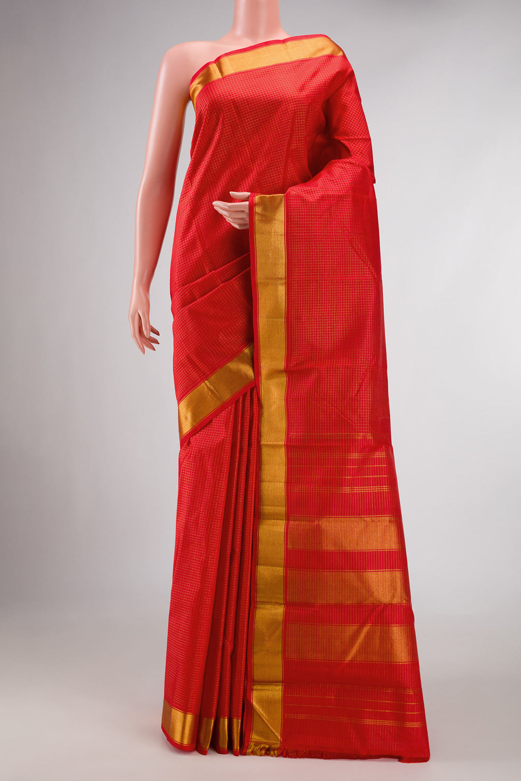 Pure Silk Pure Zari Red Dual Tone Kanchipuram Saree with Checked design on the body and Zari Border displayed on a mannequin