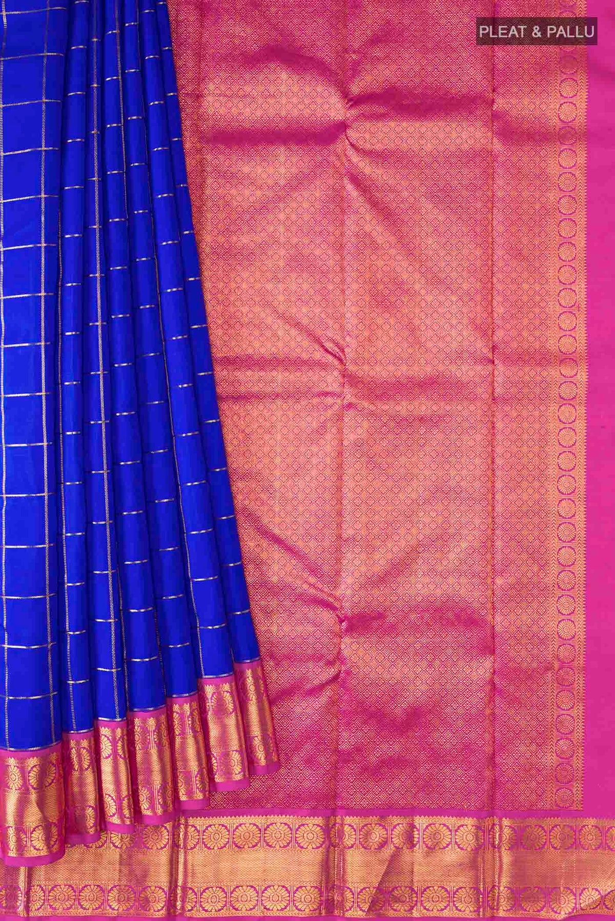 Pleats and pallu of Blue Kanchipuram Silk Saree with Checked design on the body and Zari Border