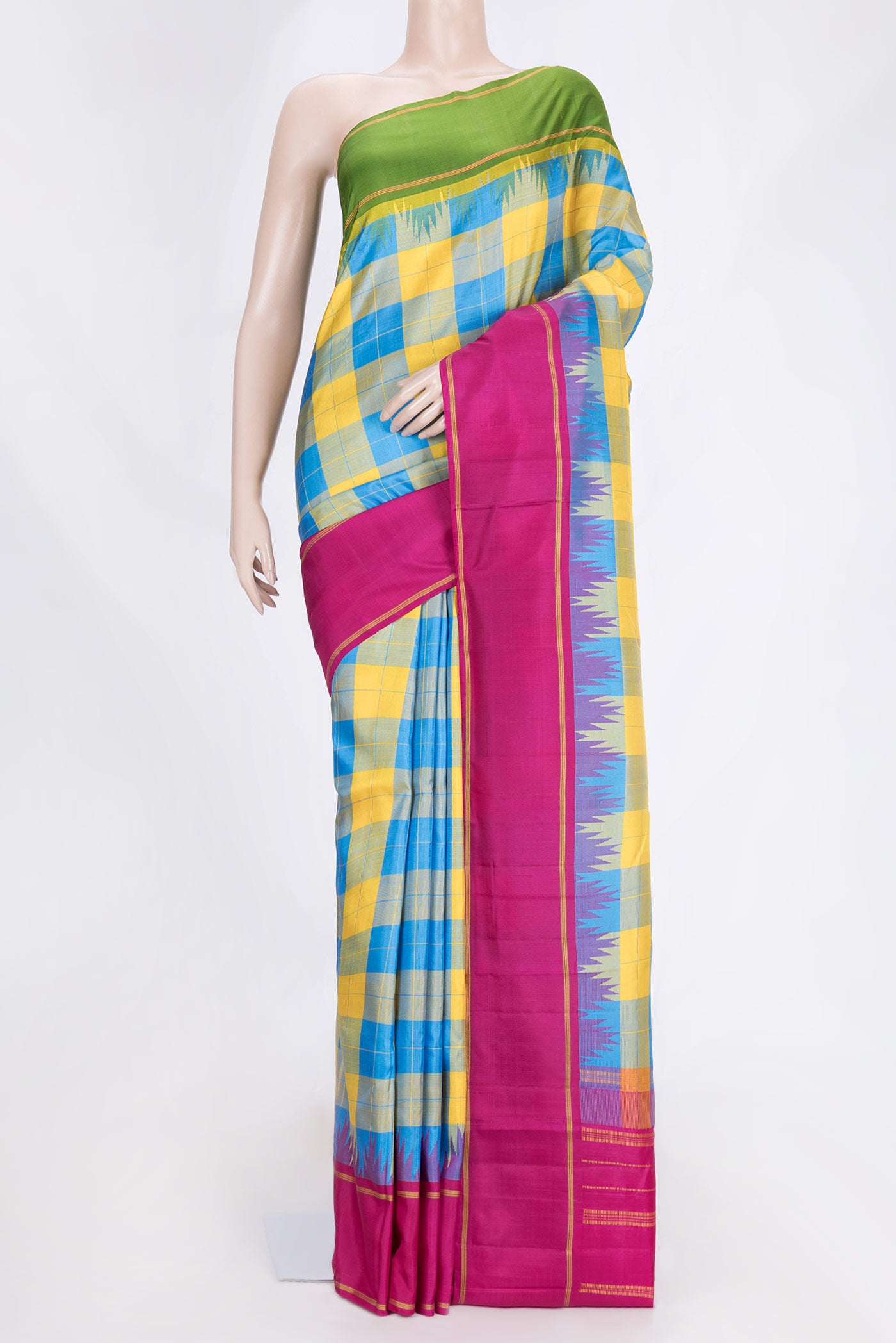 Yellow and Sky Blue Color Kanjivaram Saree with Checked design on the body and Ganga Jamuna Border.  displayed on a mannequin
