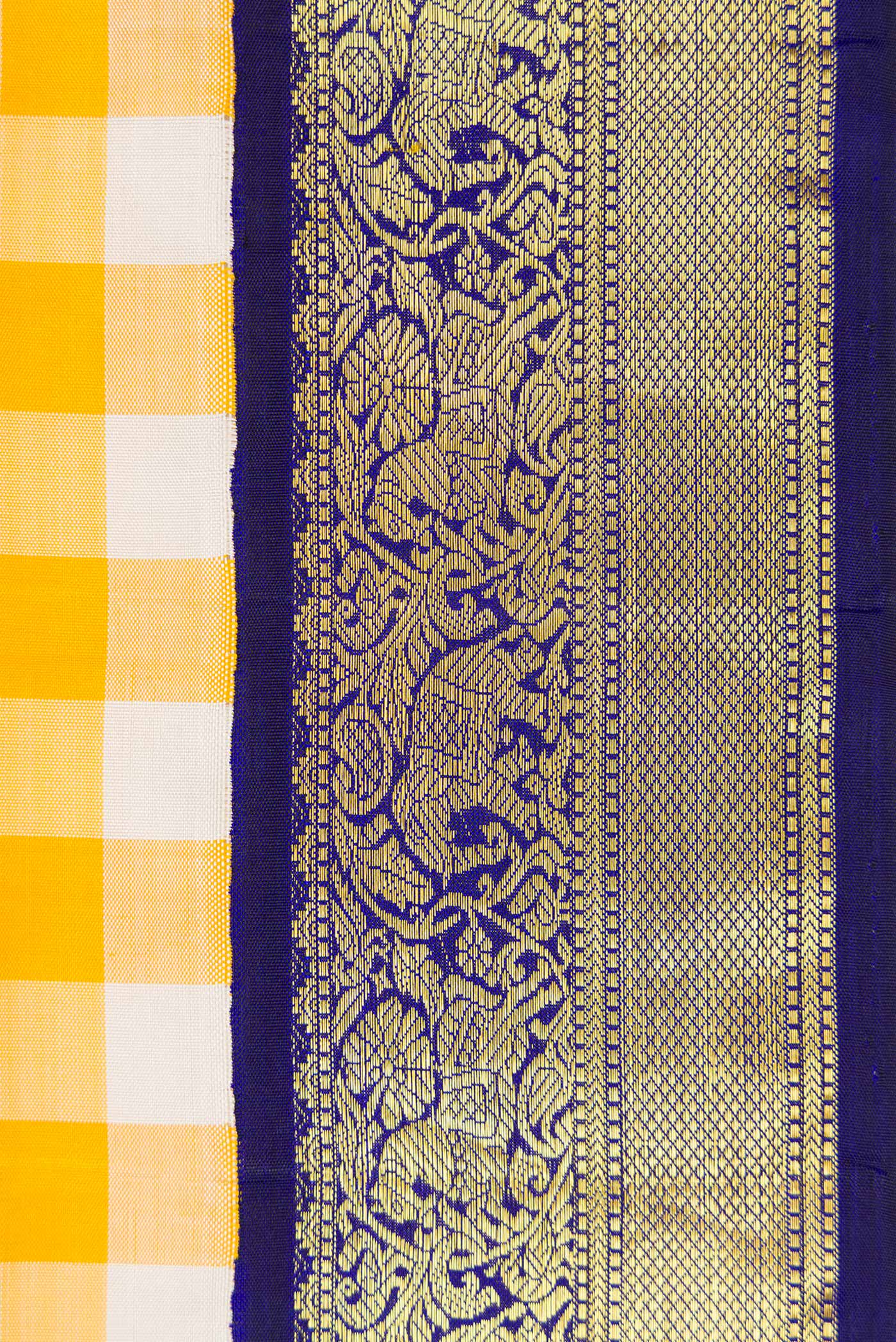 Border image of Pure Silk Pure Zari Off White and Musturd Color Kanchipuram Nine Yards Saree with Checked design on the body and Zari Border. 
