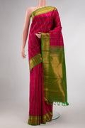 Maroon Dual Tone Kanchipuram Silk Saree with Checked design on the body and Zari Border displayed on a mannequin