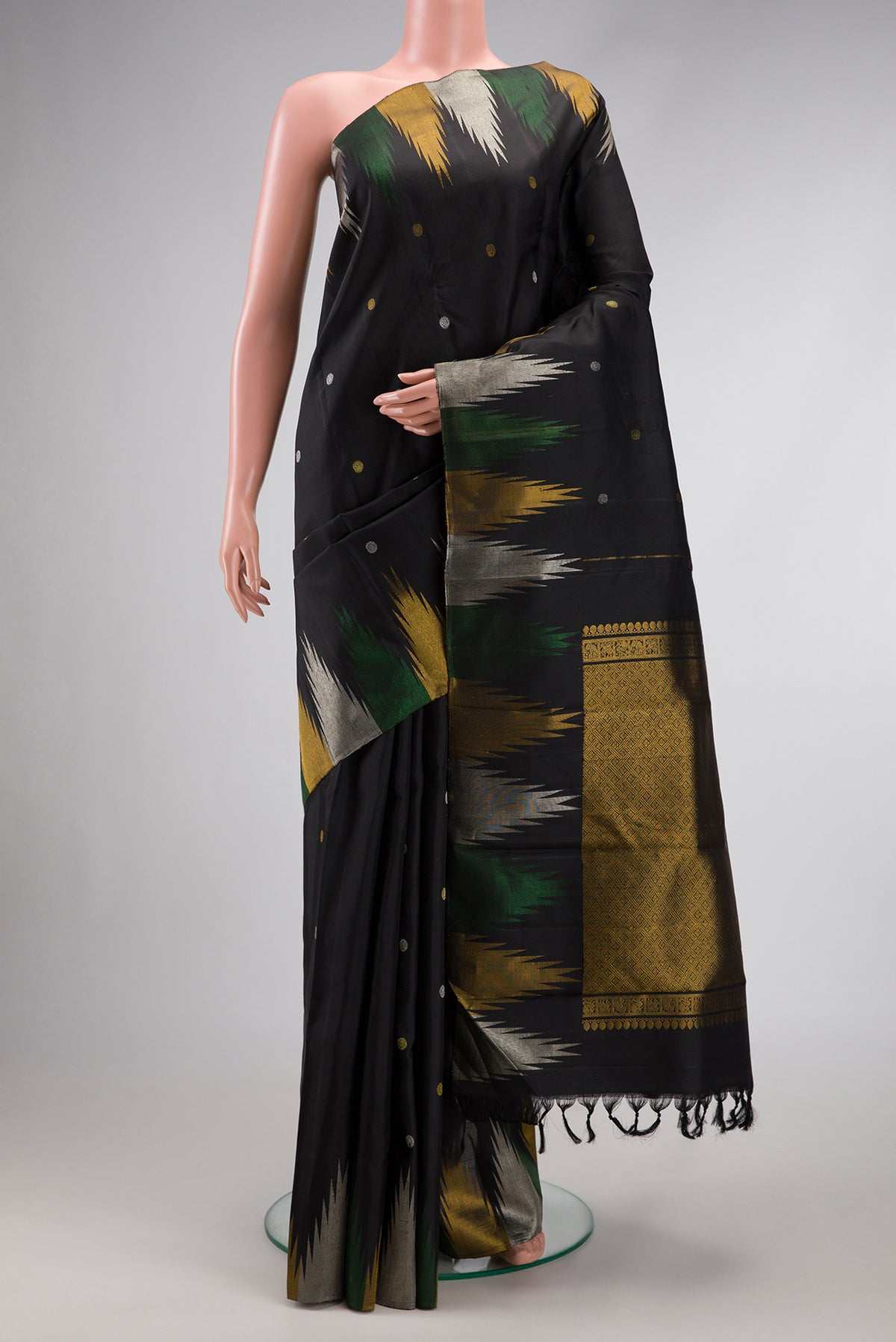 Black Dual Tone Kanjivaram Silk Saree with Zari Butta on the body and Temple Border.  displayed on a mannequin
