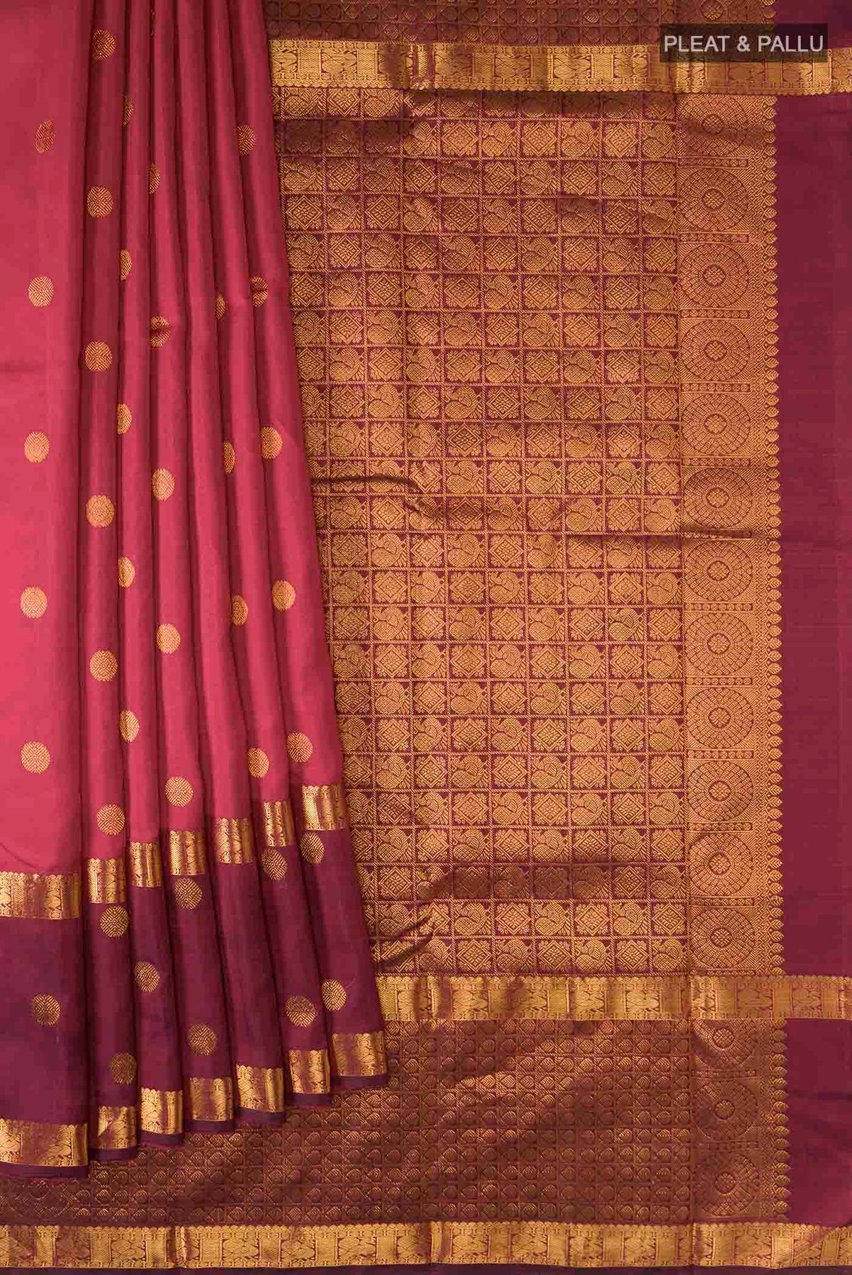 Pleats and pallu of Pink Kanchipuram Silk Saree with Zari Butta on the body and Zari Border