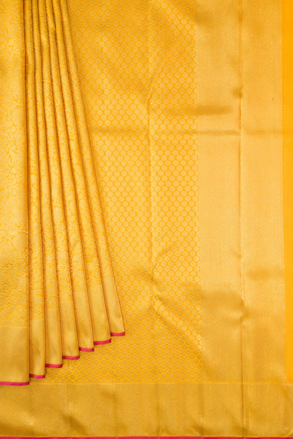 Pleats and pallu of Pure Silk Pure Zari Gold Dual Tone Kanjivaram Saree with Zari Brocade on the body and Zari Border. 