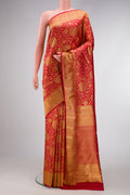 Pure Silk Pure Zari Red Dual Tone Kanjivaram Saree with Zari Brocade on the body and Zari Border.  displayed on a mannequin