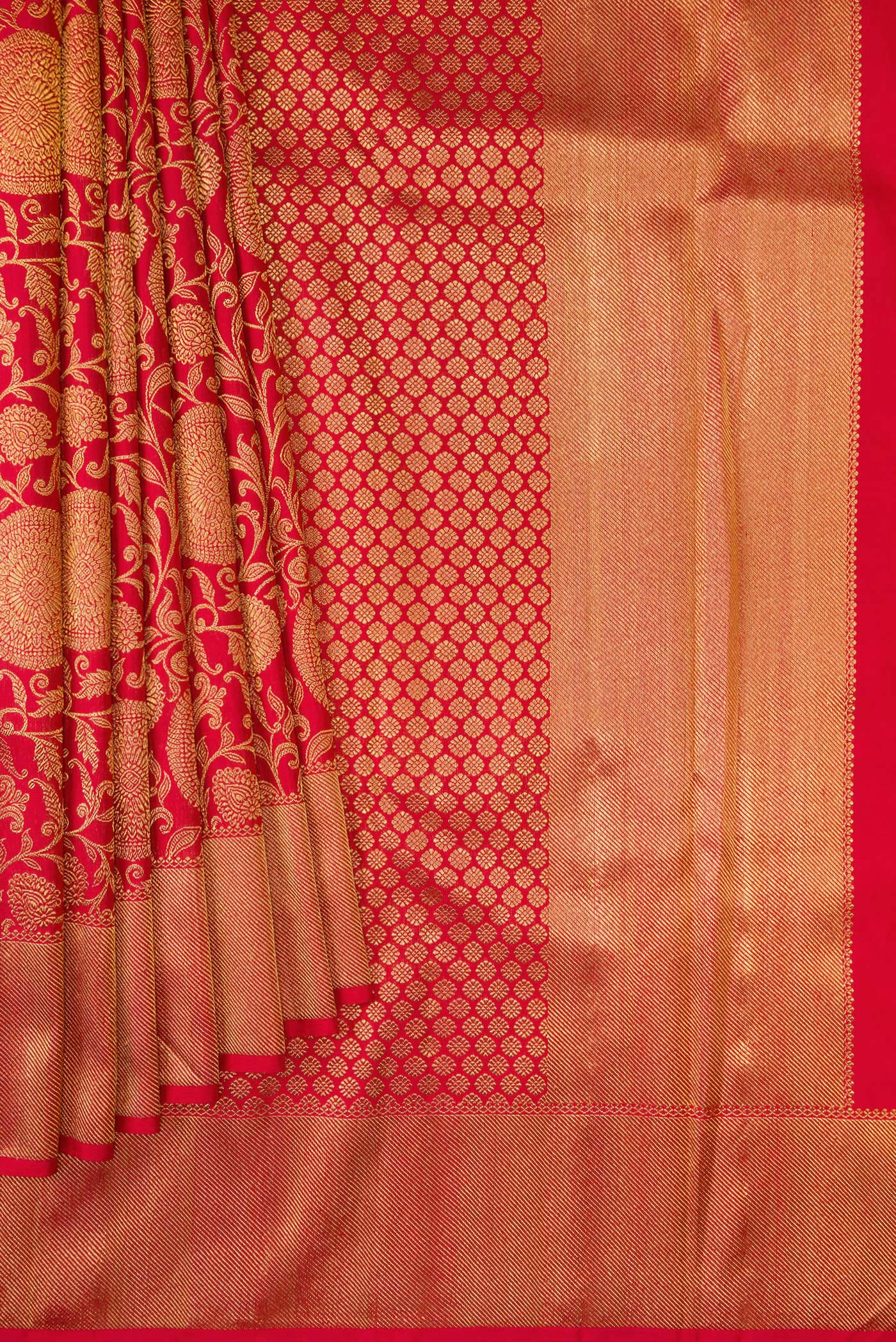 Pleats and pallu of Pure Silk Pure Zari Red Dual Tone Kanjivaram Saree with Zari Brocade on the body and Zari Border. 