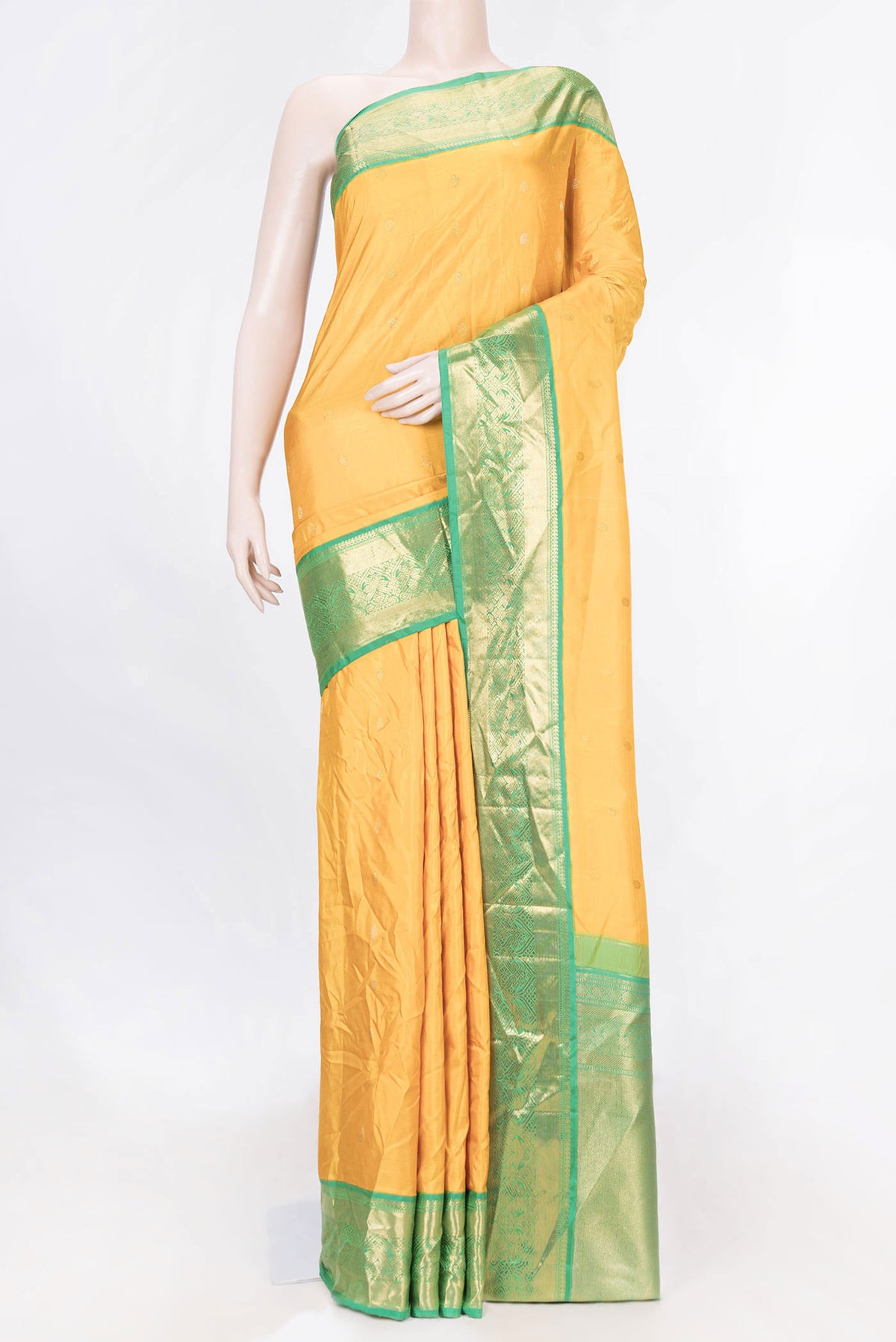 Mustard Dual Tone Kanchipuram Saree with Zari Butta on the body and Zari Border displayed on a mannequin