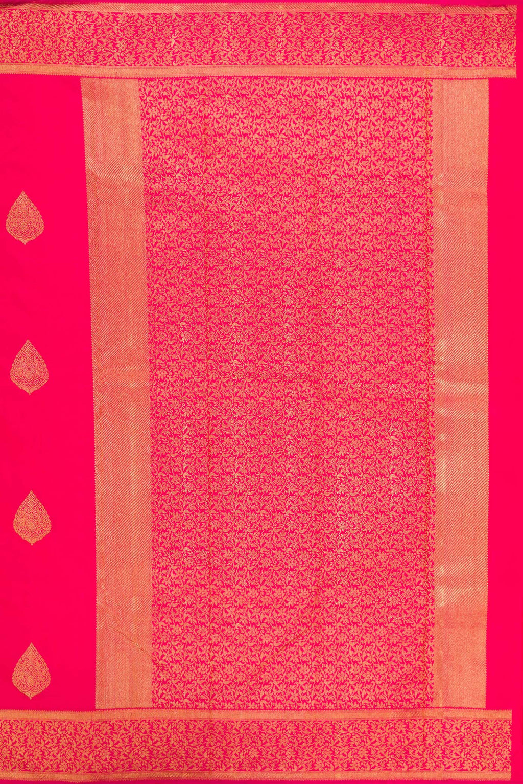 Close up image of the pallu of Pure Silk Pure Zari Pink Kanjivaram Saree with Zari Butta on the body and Zari Border. 