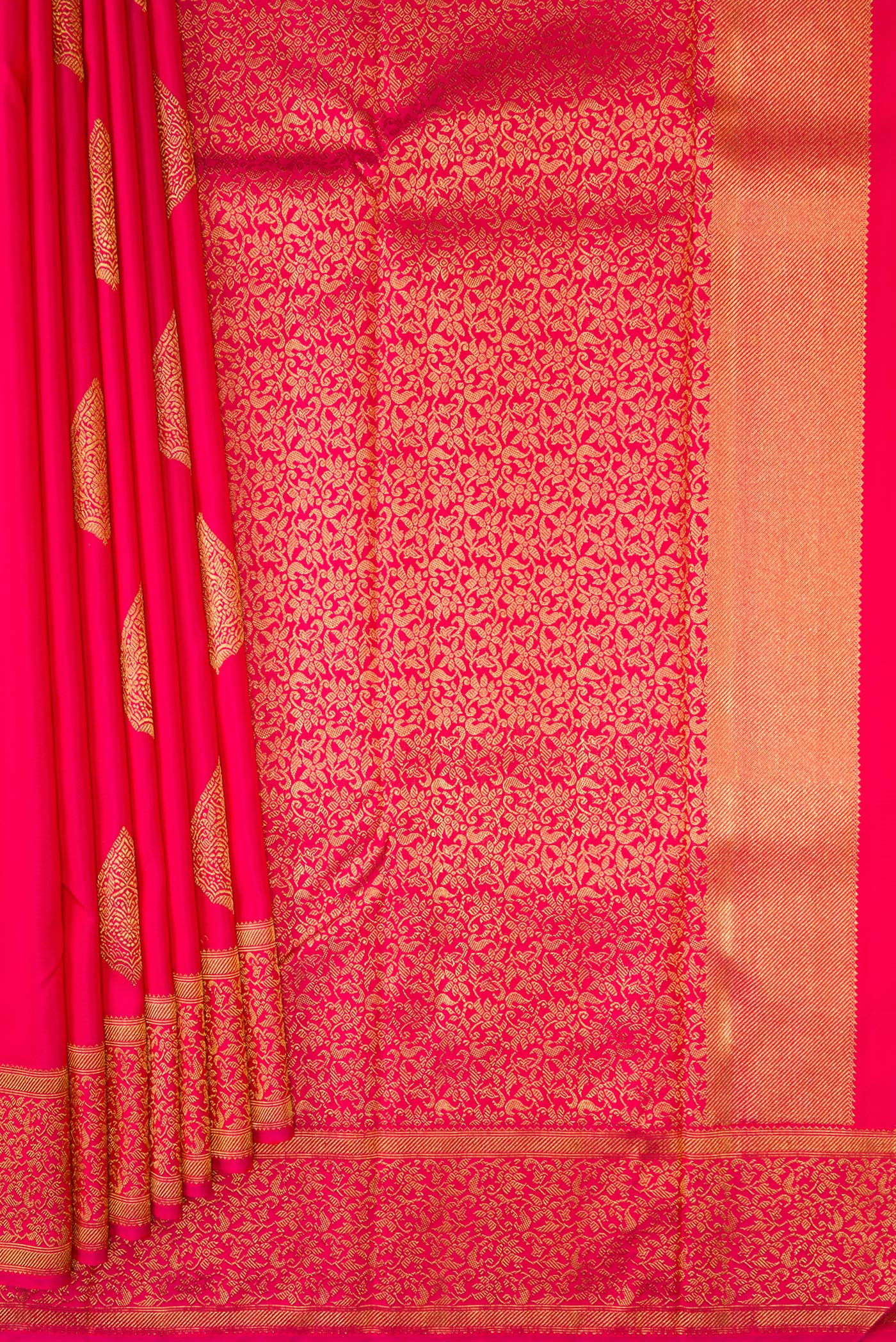 Pleats and pallu of Pure Silk Pure Zari Pink Kanjivaram Saree with Zari Butta on the body and Zari Border. 