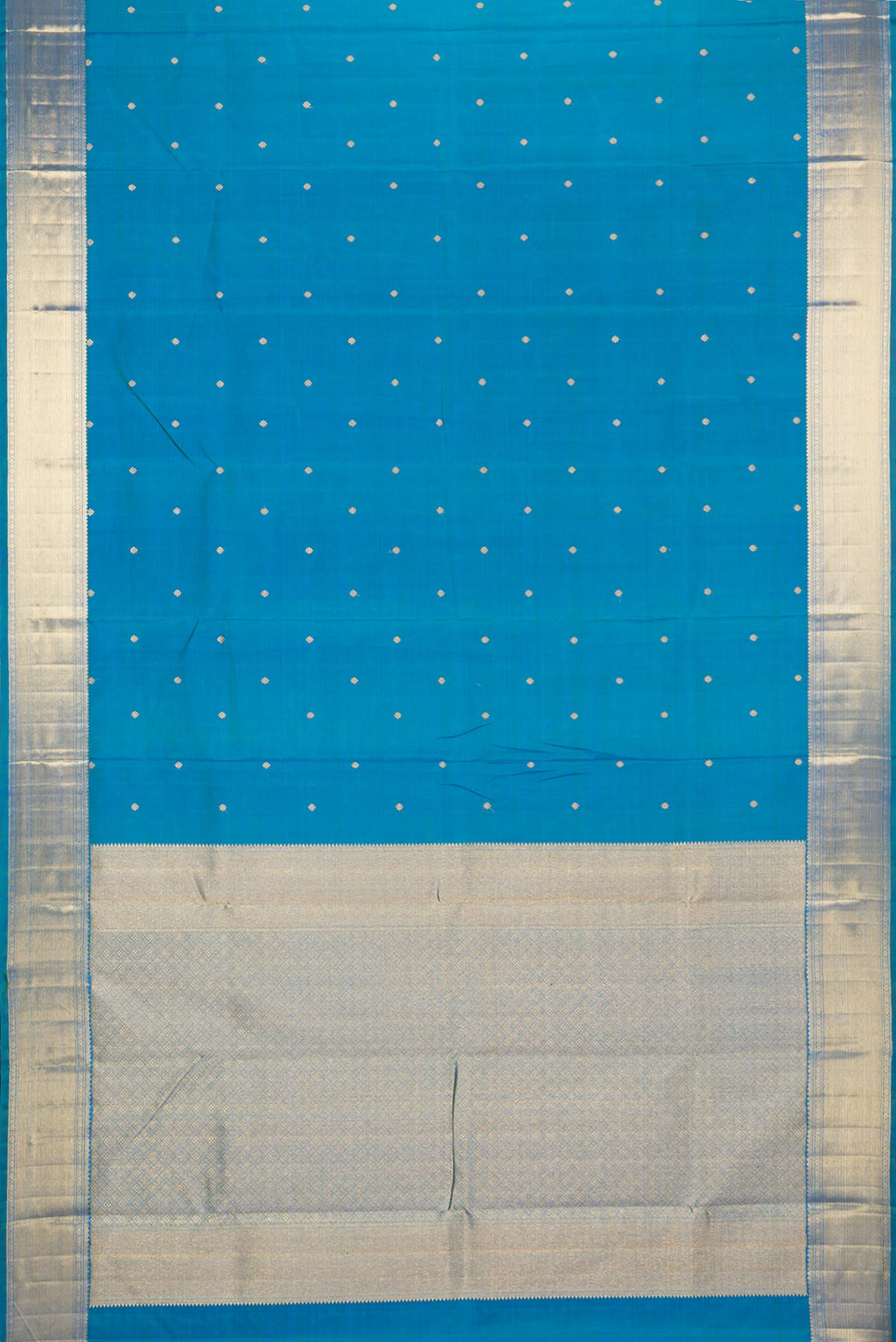Flat view of Pure Silk Pure Zari Peacock Blue Kanjivaram Saree with Zari Butta on the body and Fancy Border. 