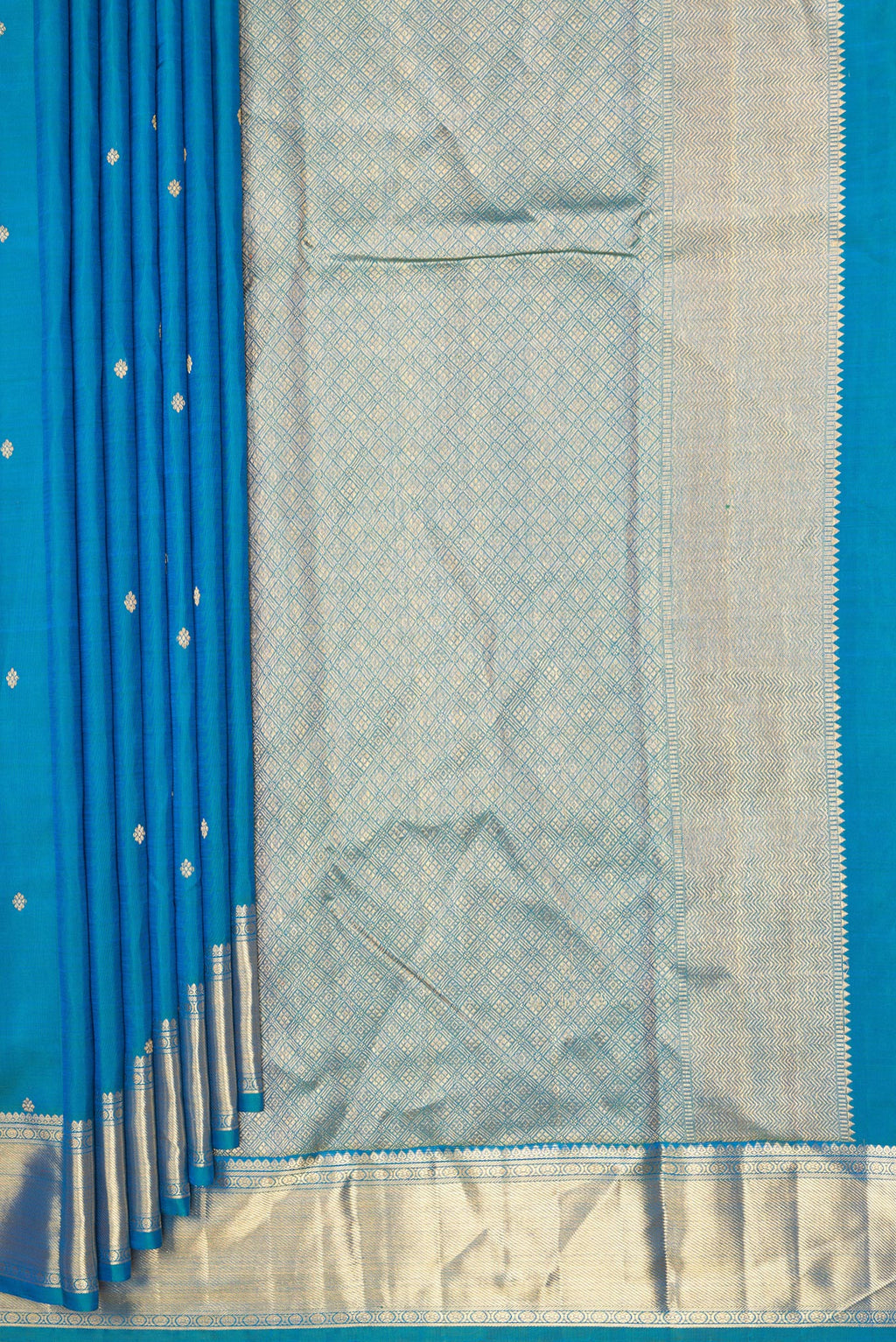 Pleats and pallu of Pure Silk Pure Zari Peacock Blue Kanjivaram Saree with Zari Butta on the body and Fancy Border. 
