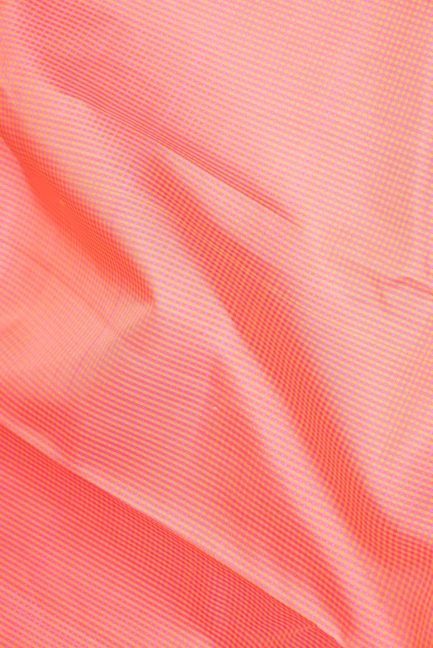 Close up of Pink Dual Tone Kanchipuram Silk Saree with Checked design on the body and Zari Border displaying folds