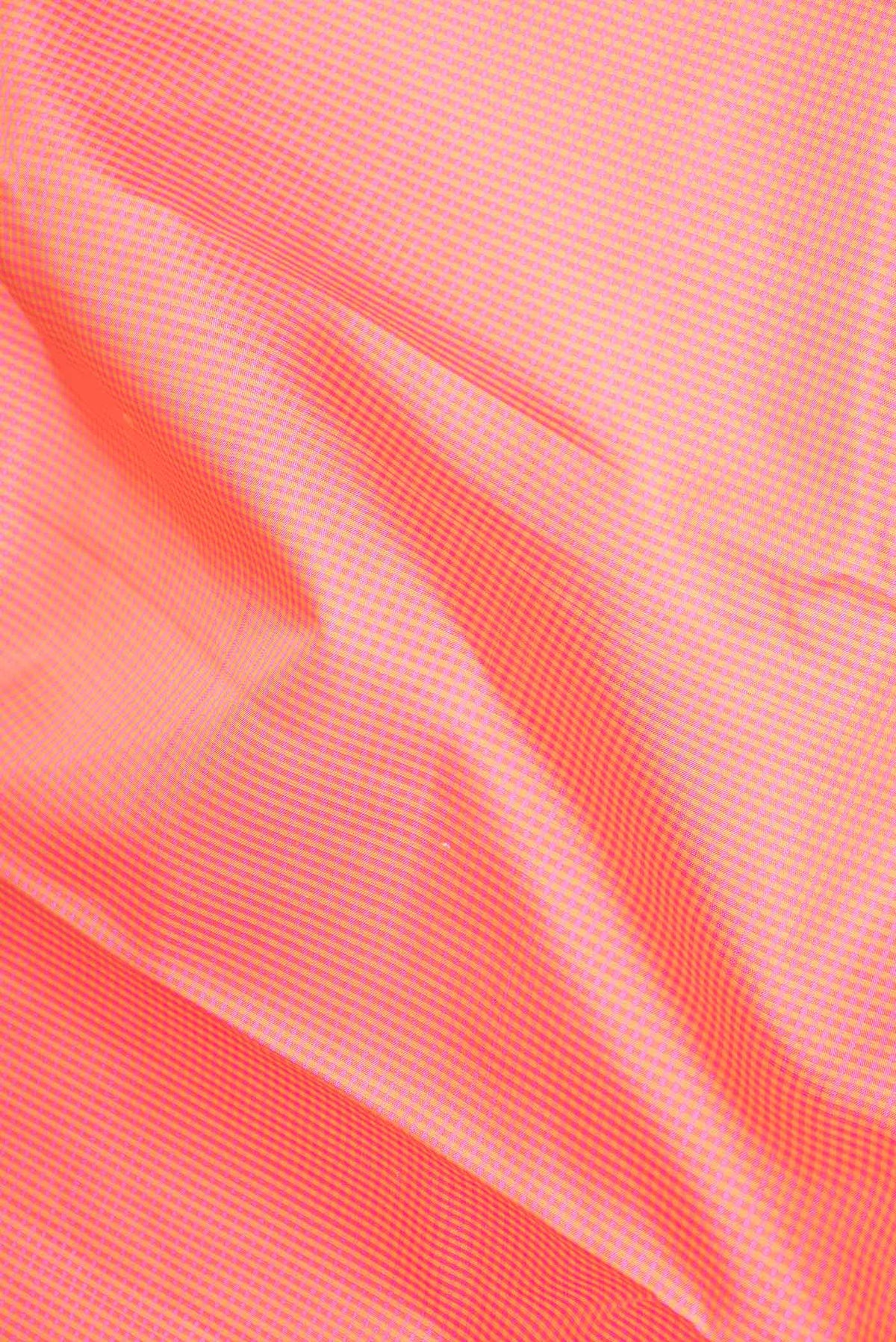 Close up of Pink Dual Tone Kanchipuram Silk Saree with Checked design on the body and Zari Border displaying folds