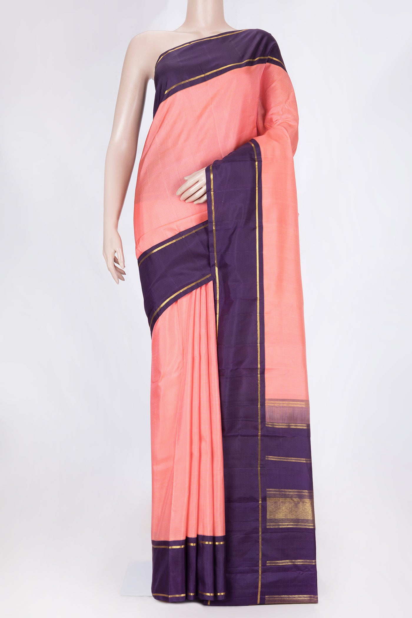 Pink Dual Tone Kanchipuram Silk Saree with Checked design on the body and Zari Border displayed on a mannequin