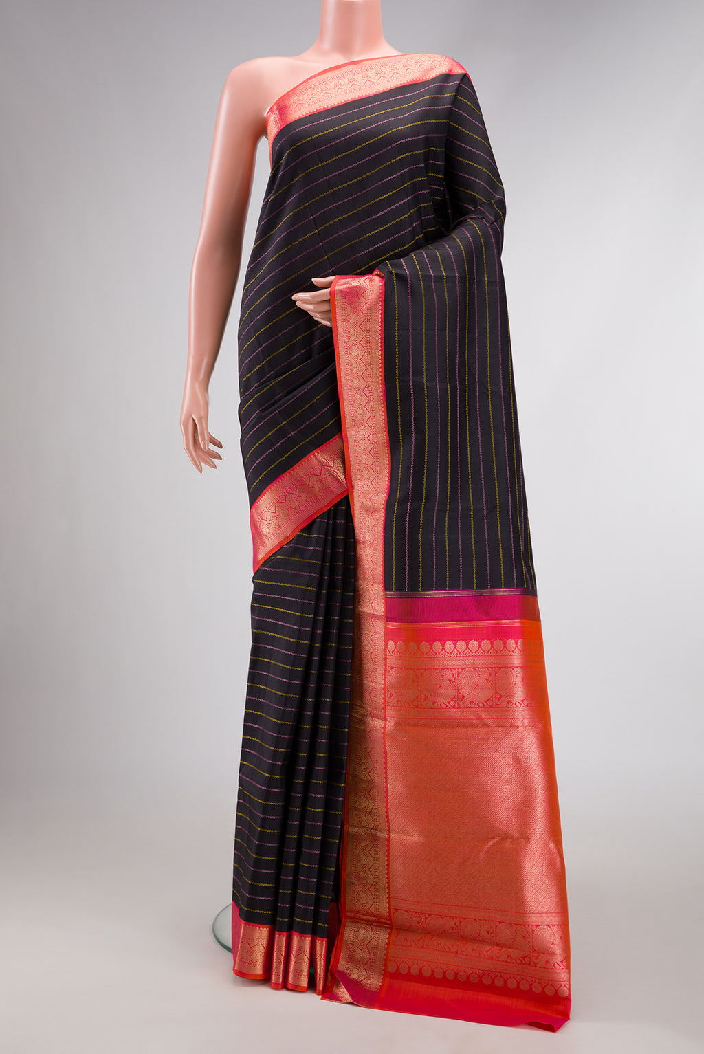 Pure Silk Pure Zari Black Dual Tone Kanjivaram Saree with Veldhari on the body and Zari Border.  displayed on a mannequin